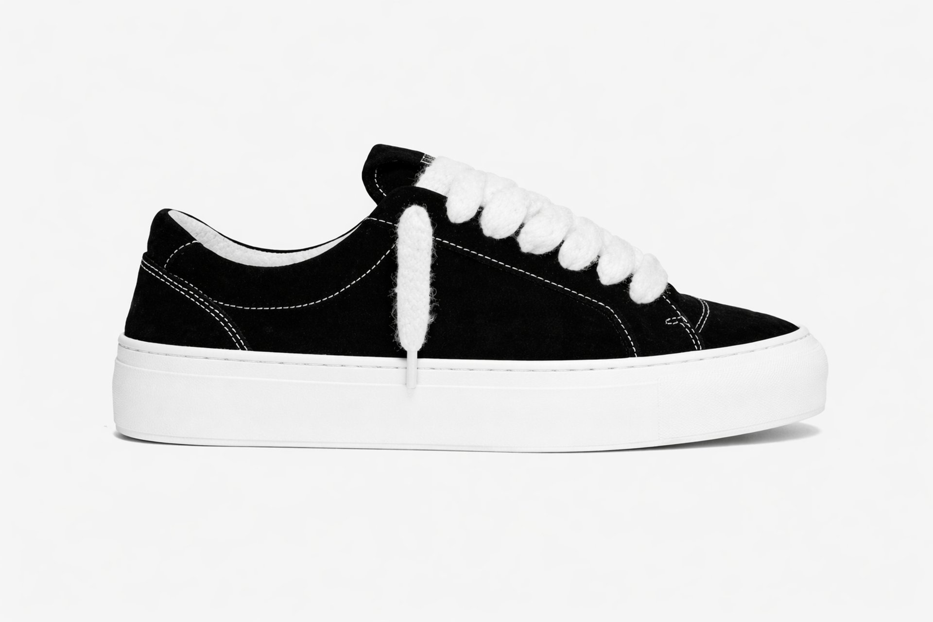 person wearing grey knit sweater