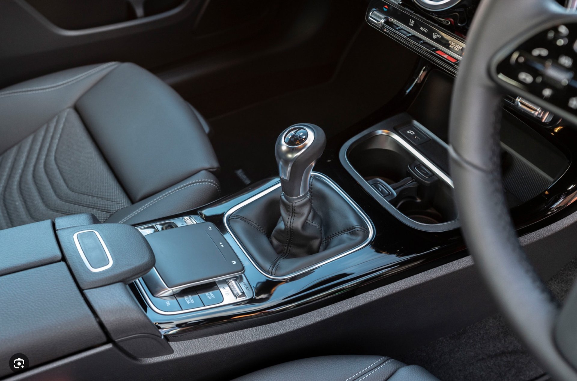 black asphalt road between green trees during daytime