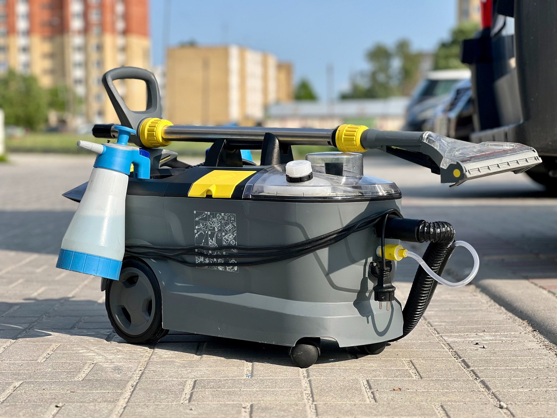 hallway with sconces and carpet