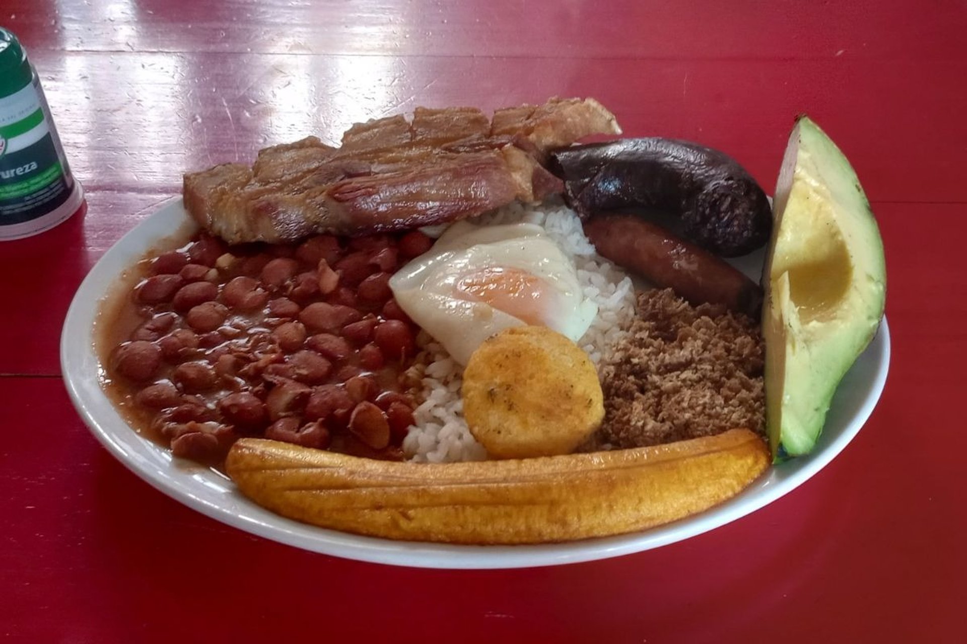 woman wearing yellow long-sleeved dress under white clouds and blue sky during daytime