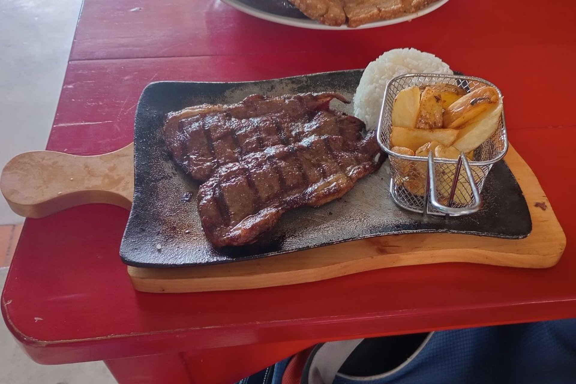 woman wearing yellow long-sleeved dress under white clouds and blue sky during daytime