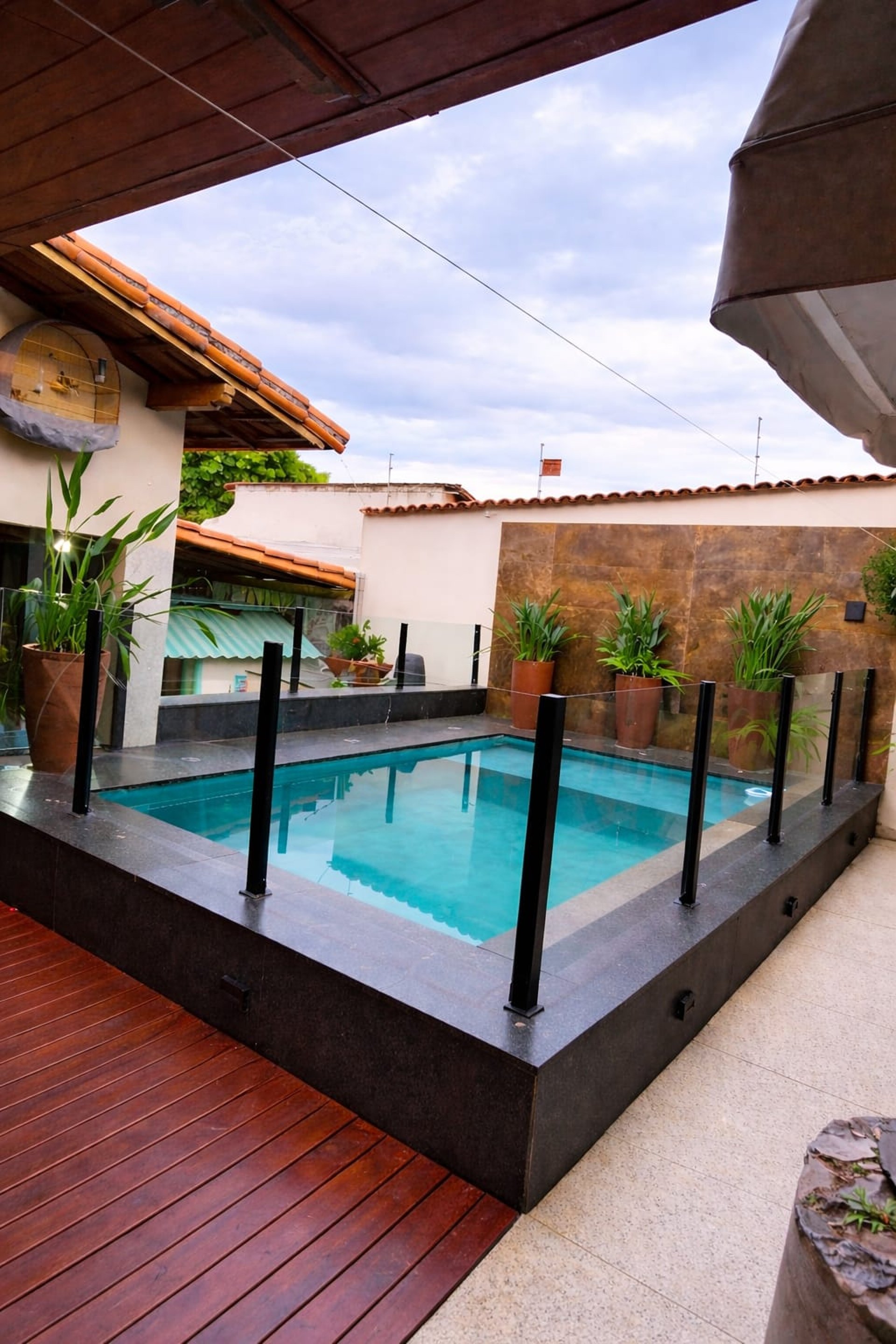 black and brown leather padded tub sofa