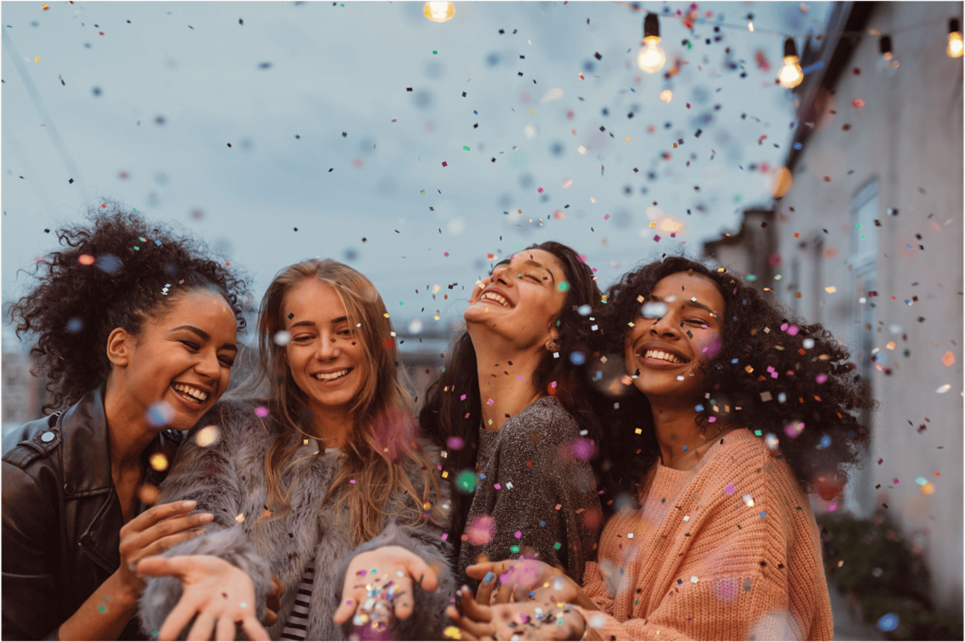 silhouette of woman wearing black hat and black coat