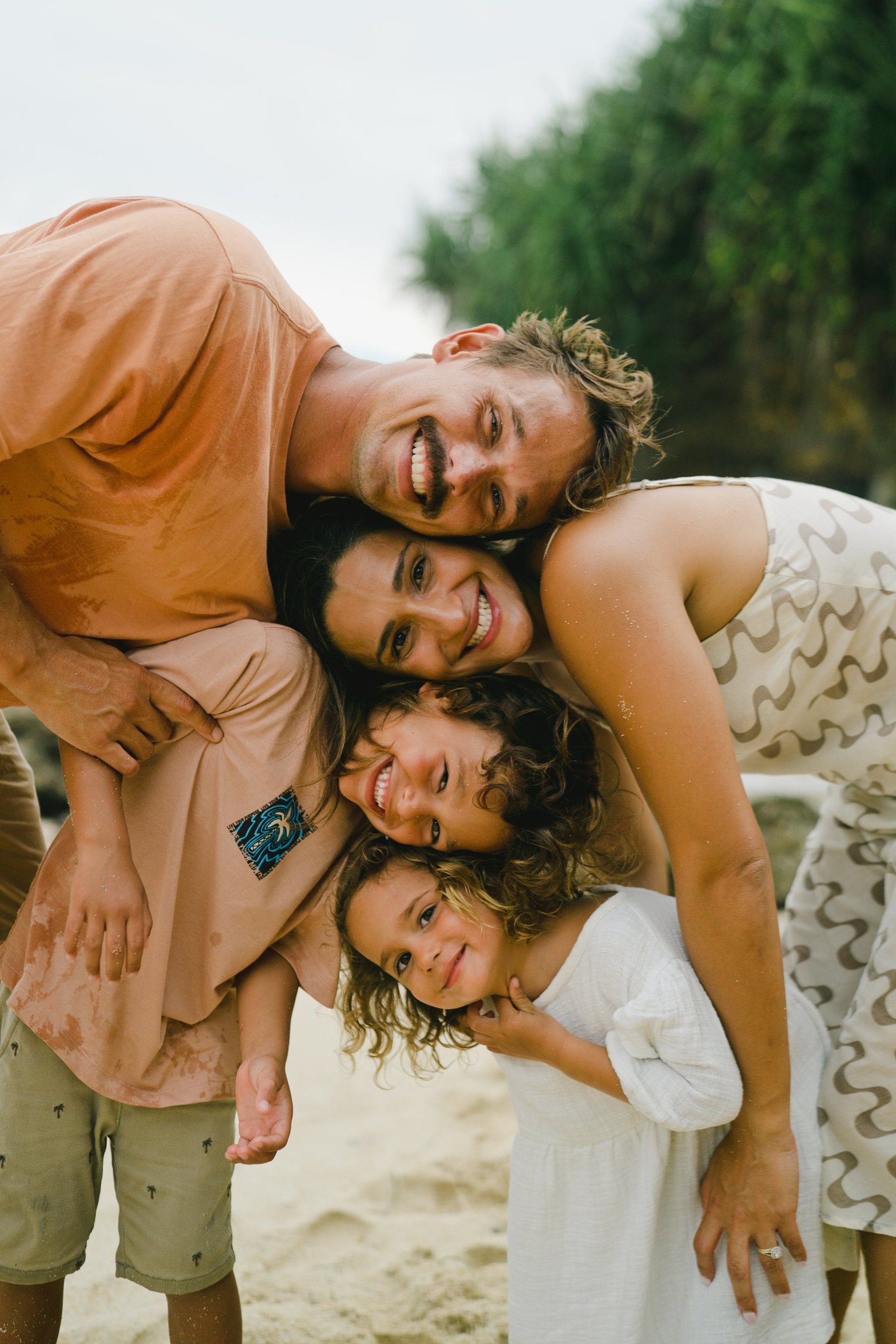 an abstract photo of a curved building with a blue sky in the background