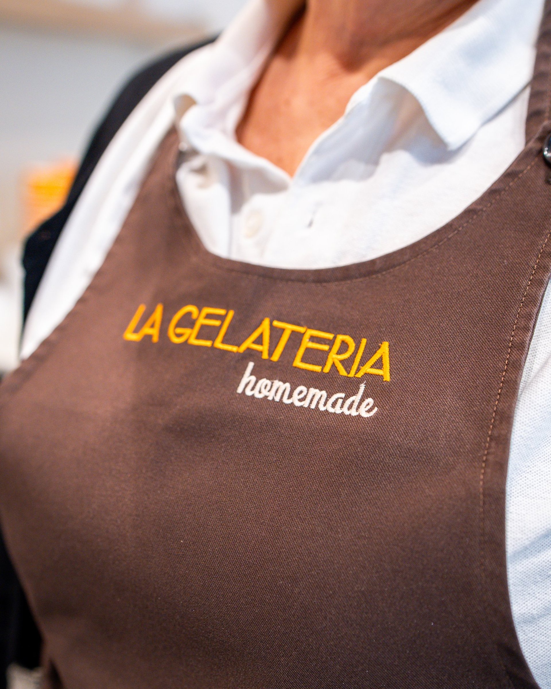 woman wearing yellow long-sleeved dress under white clouds and blue sky during daytime