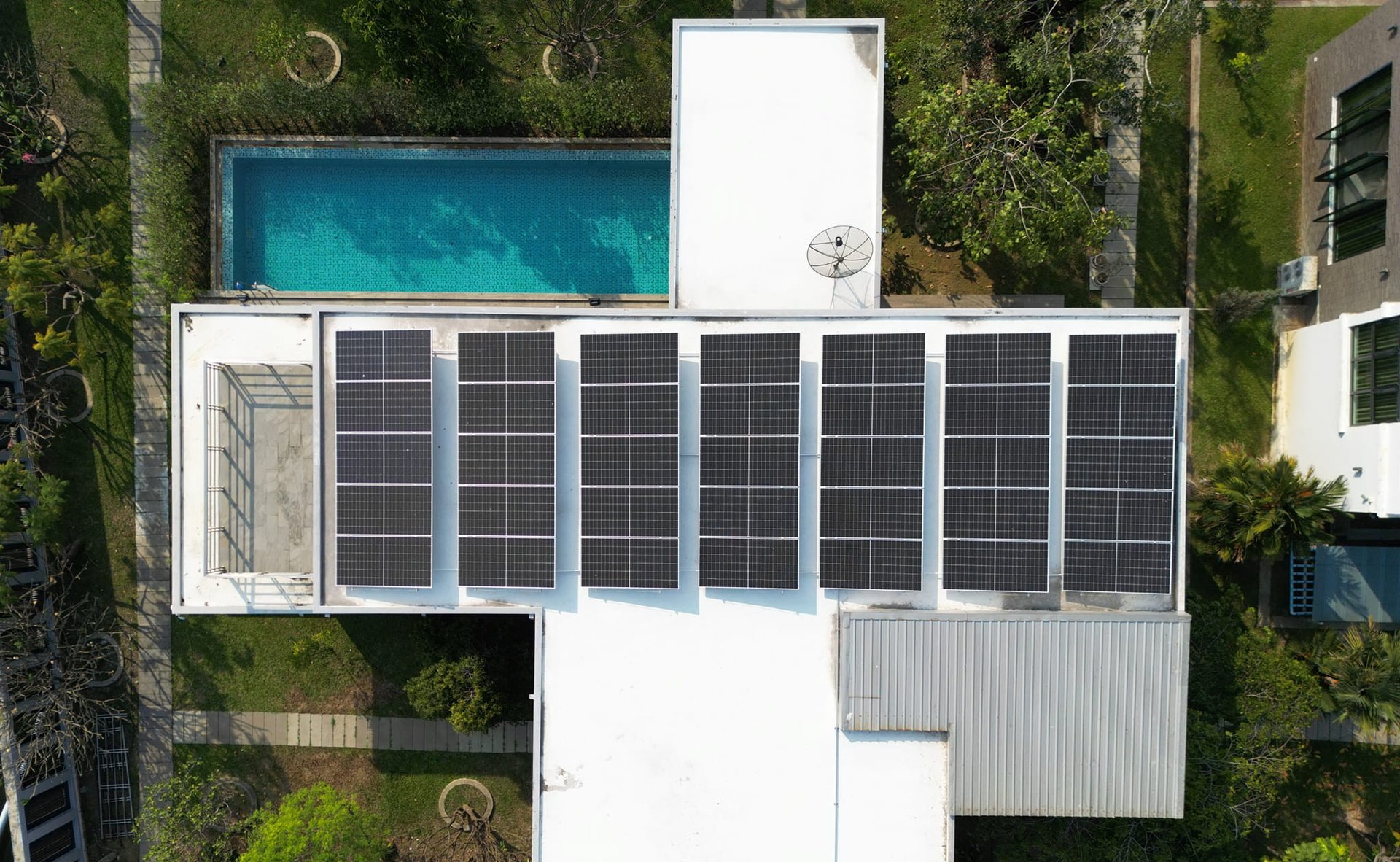 an abstract photo of a curved building with a blue sky in the background