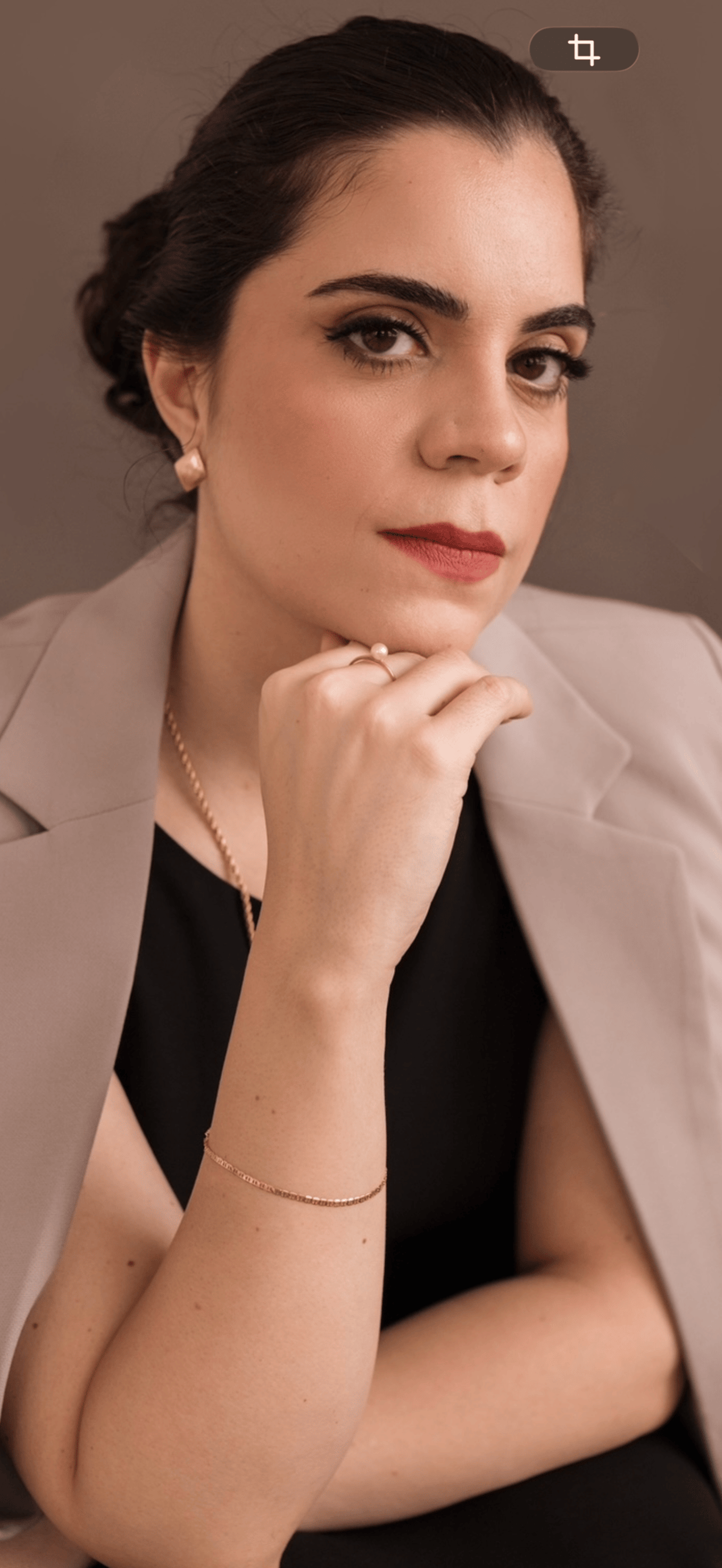 an abstract photo of a curved building with a blue sky in the background