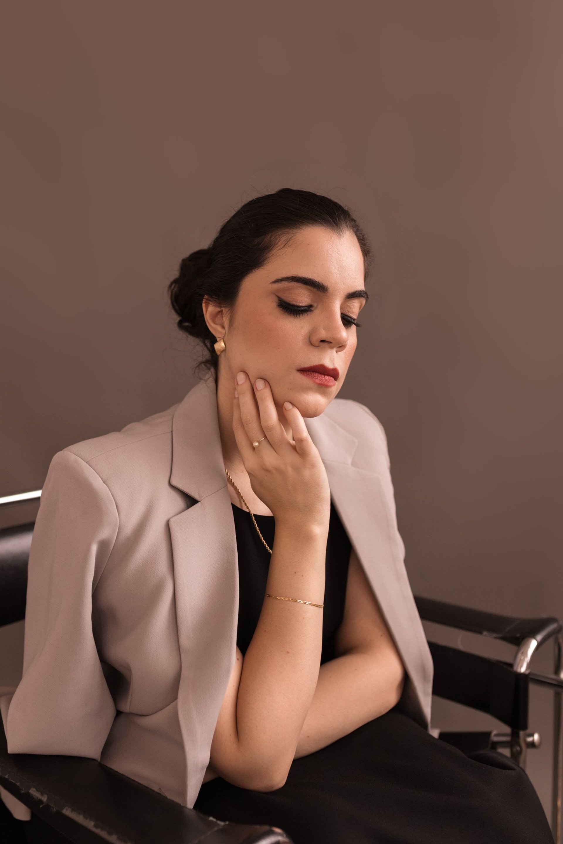 an abstract photo of a curved building with a blue sky in the background