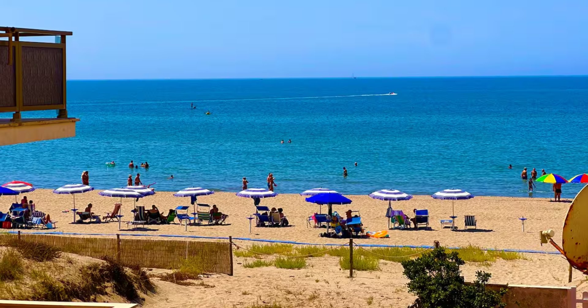 an aerial view of a city by the ocean