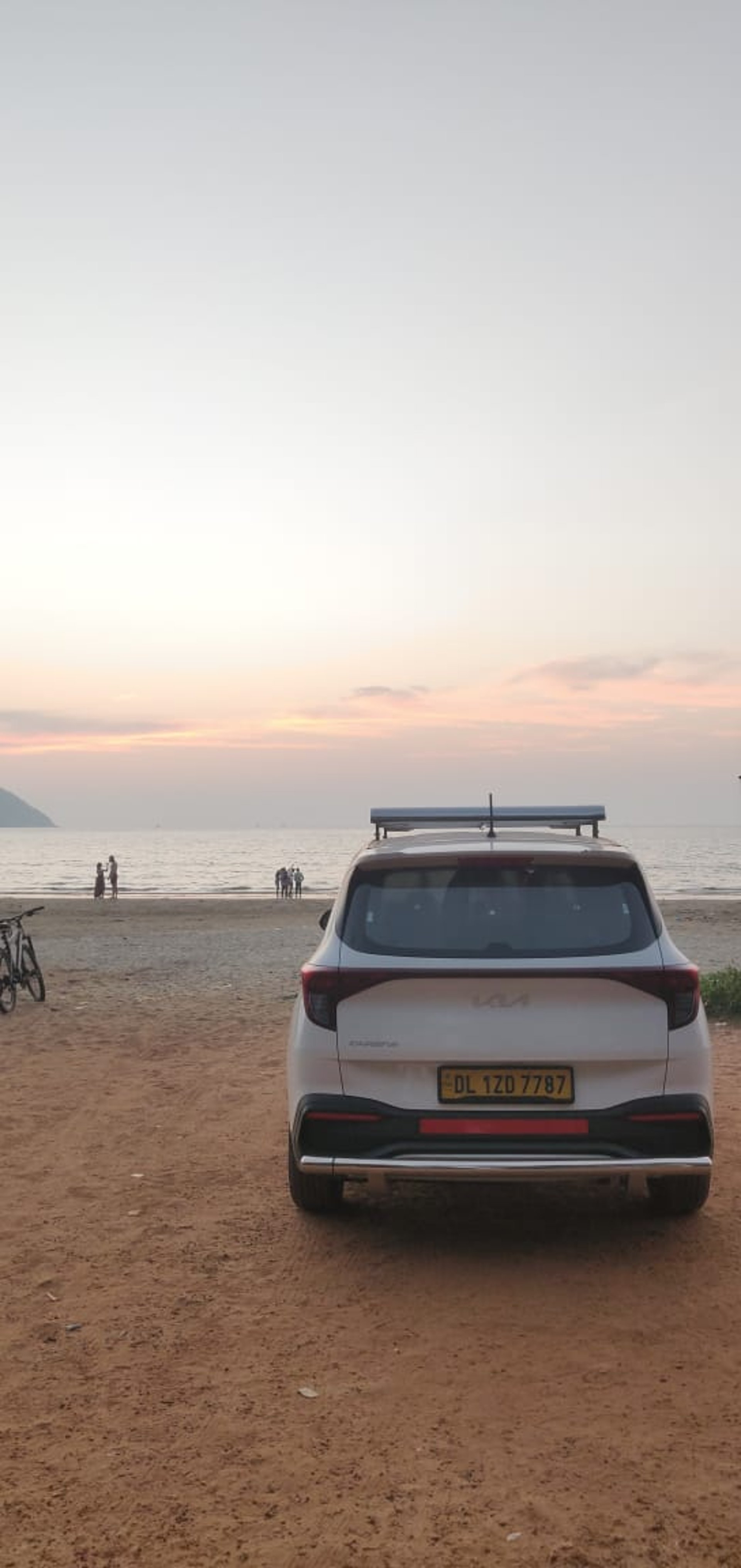a black and white photo of a car steering wheel