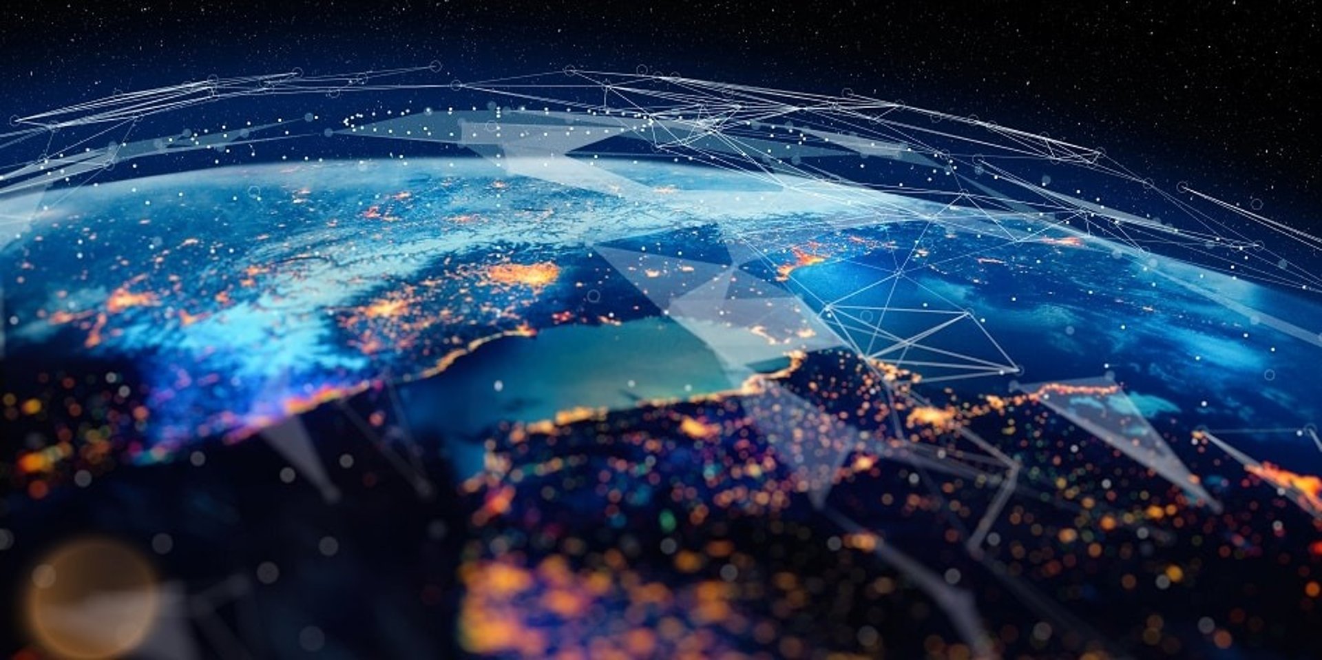 an abstract photo of a curved building with a blue sky in the background