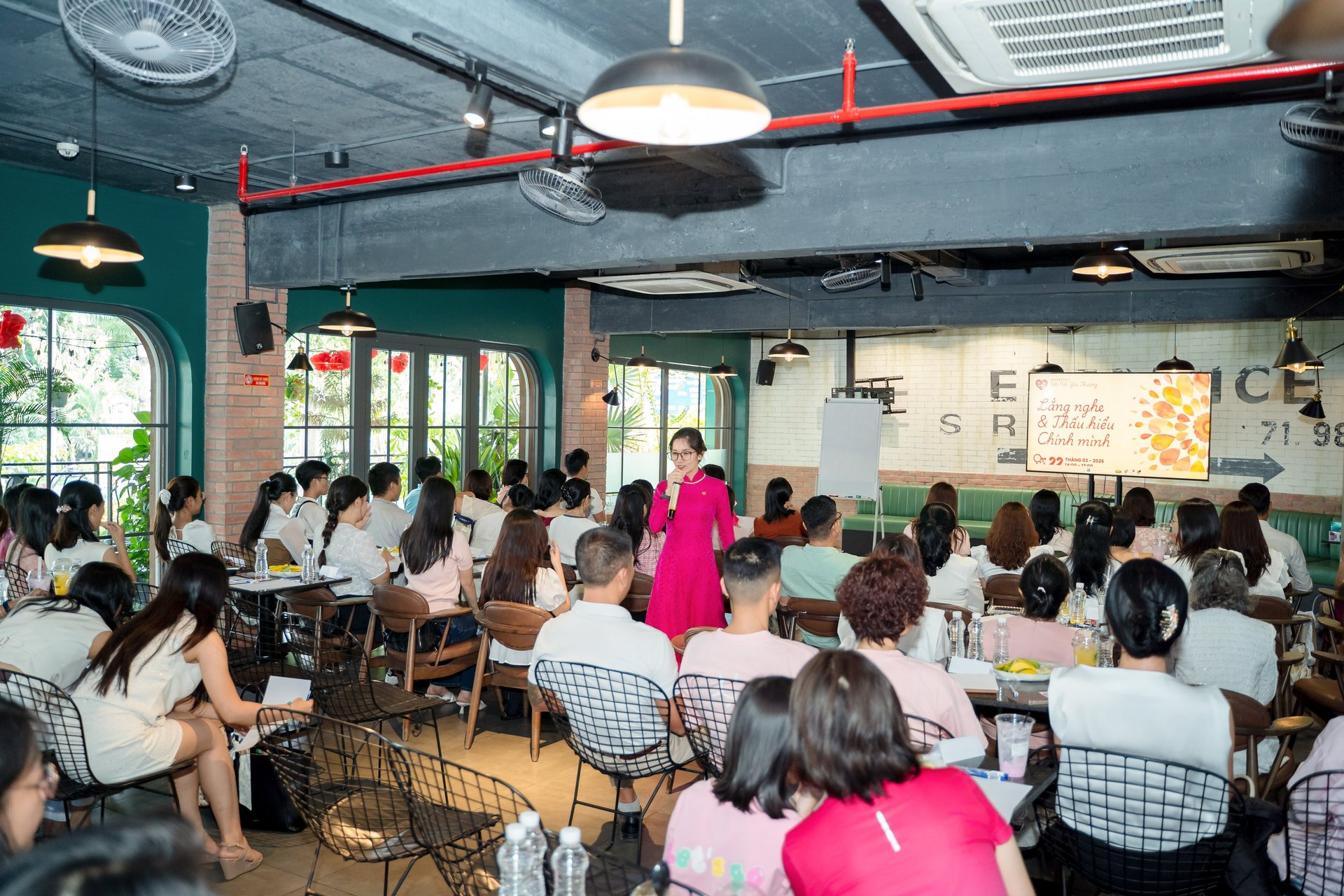 an abstract photo of a curved building with a blue sky in the background