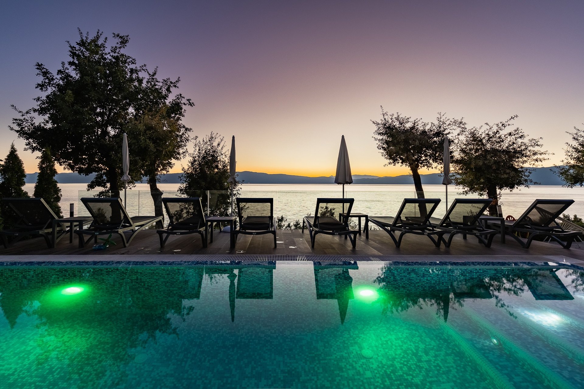 woman wearing yellow long-sleeved dress under white clouds and blue sky during daytime