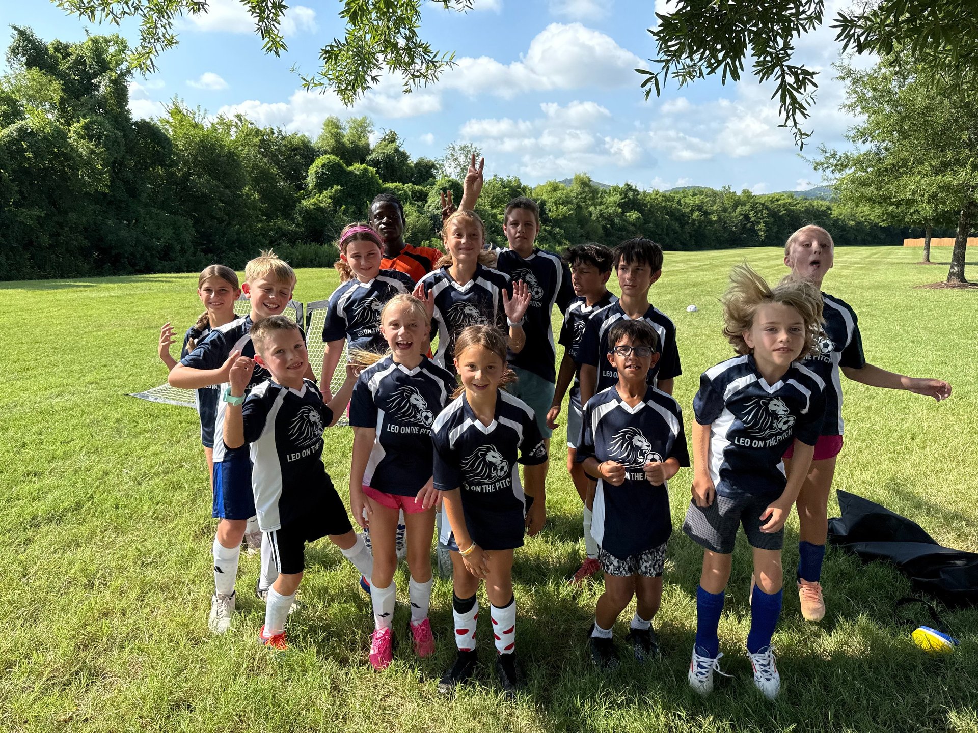 woman wearing yellow long-sleeved dress under white clouds and blue sky during daytime