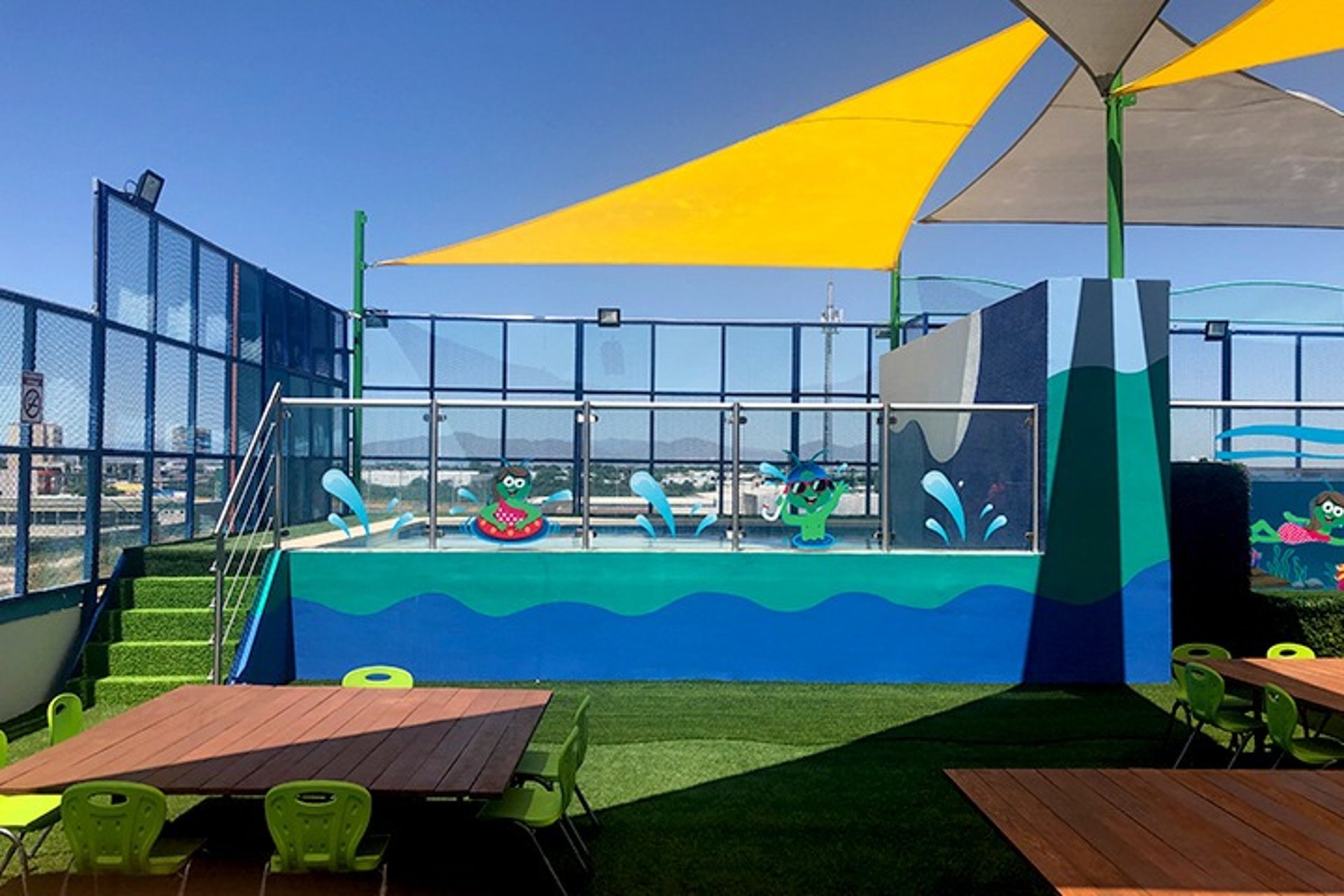 an abstract photo of a curved building with a blue sky in the background