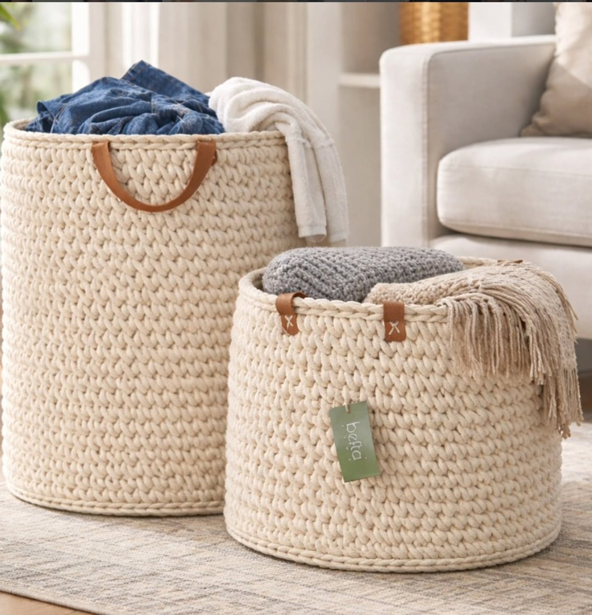 person wearing grey knit sweater