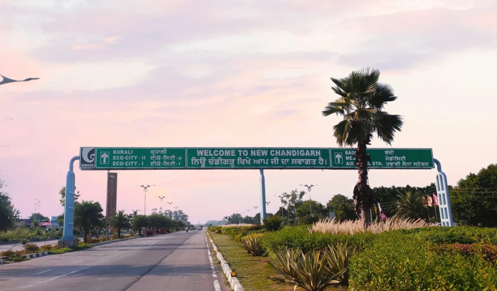 woman wearing yellow long-sleeved dress under white clouds and blue sky during daytime