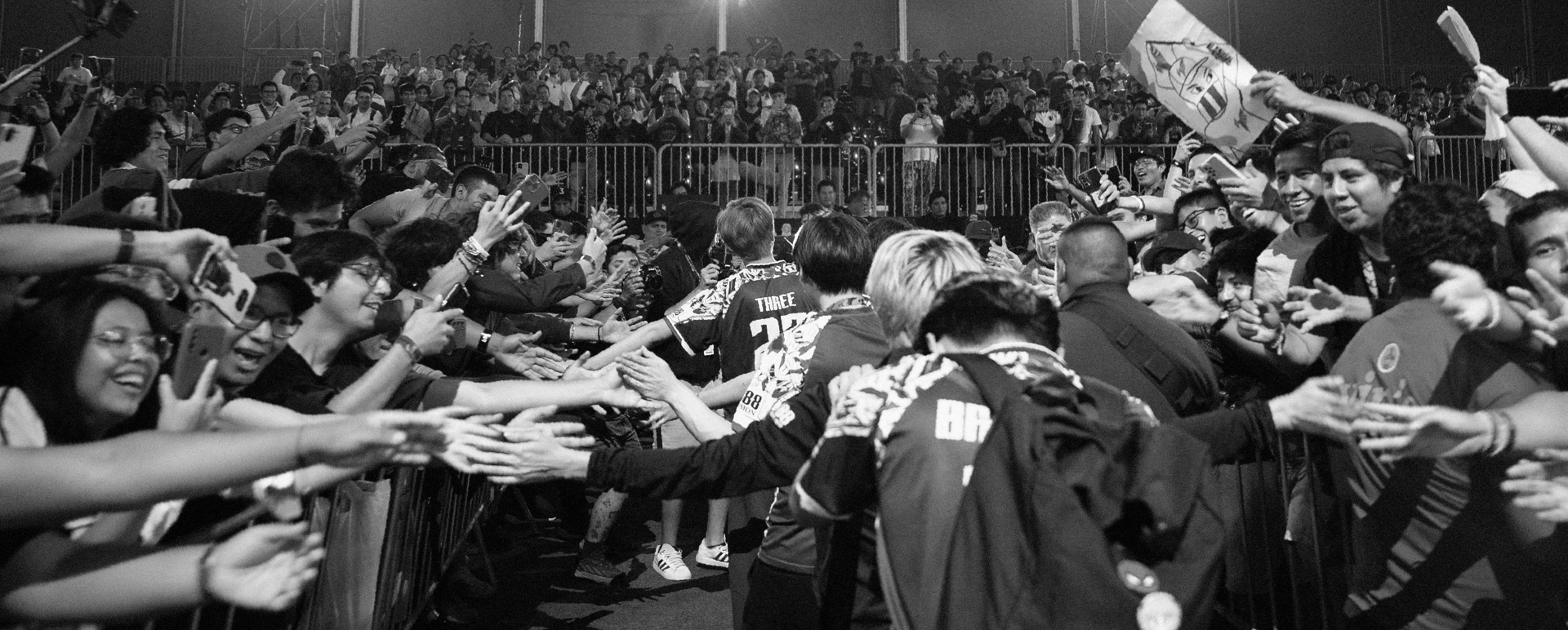 an abstract photo of a curved building with a blue sky in the background