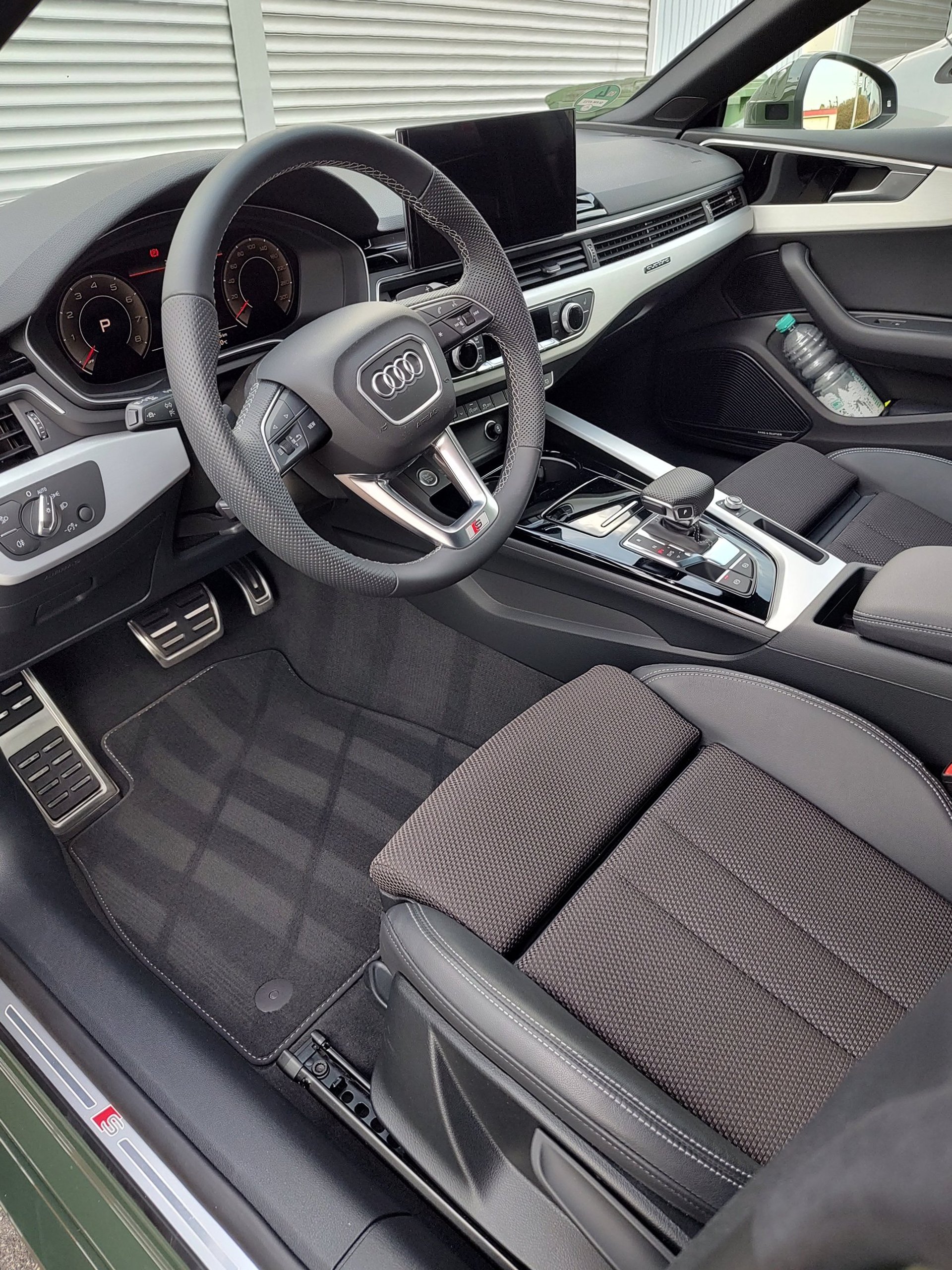 black and brown leather padded tub sofa
