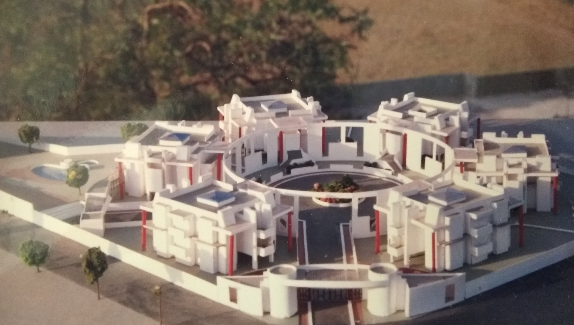 woman wearing yellow long-sleeved dress under white clouds and blue sky during daytime