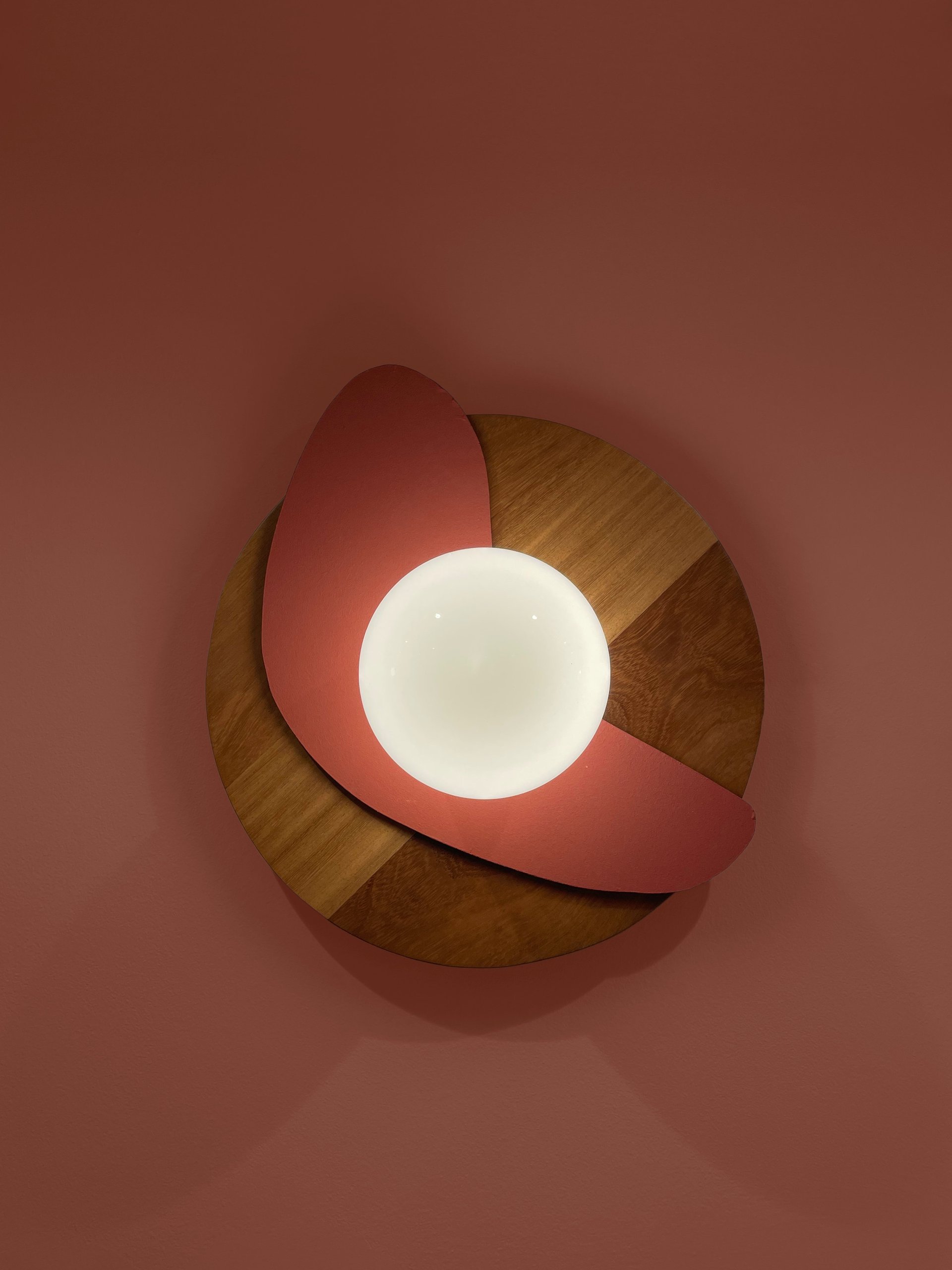 a close up of a black and brown abstract painting