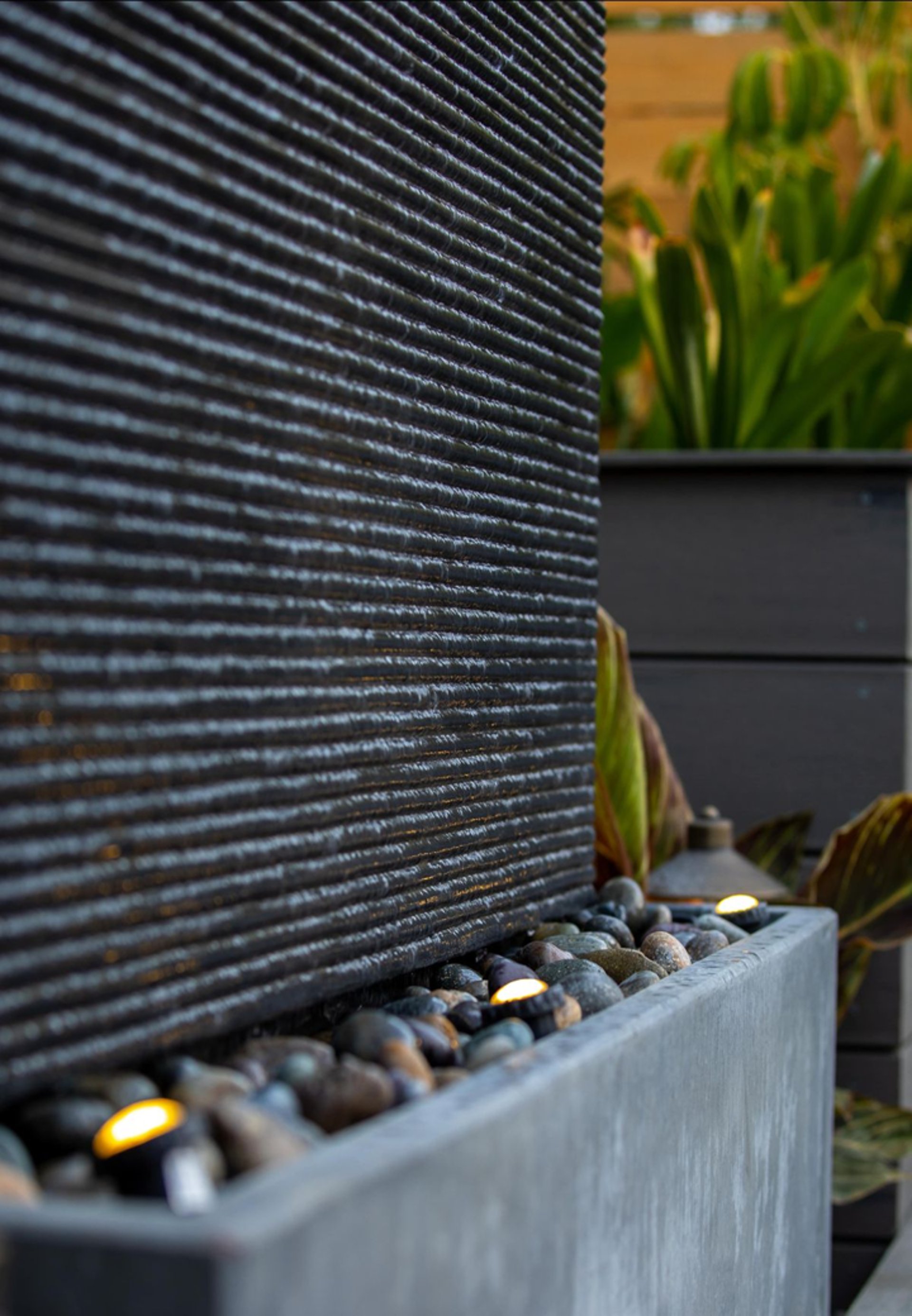 an abstract photo of a curved building with a blue sky in the background