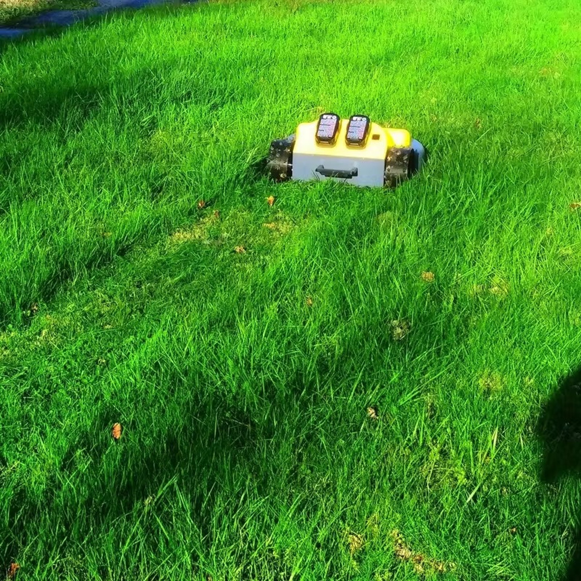 an abstract photo of a curved building with a blue sky in the background