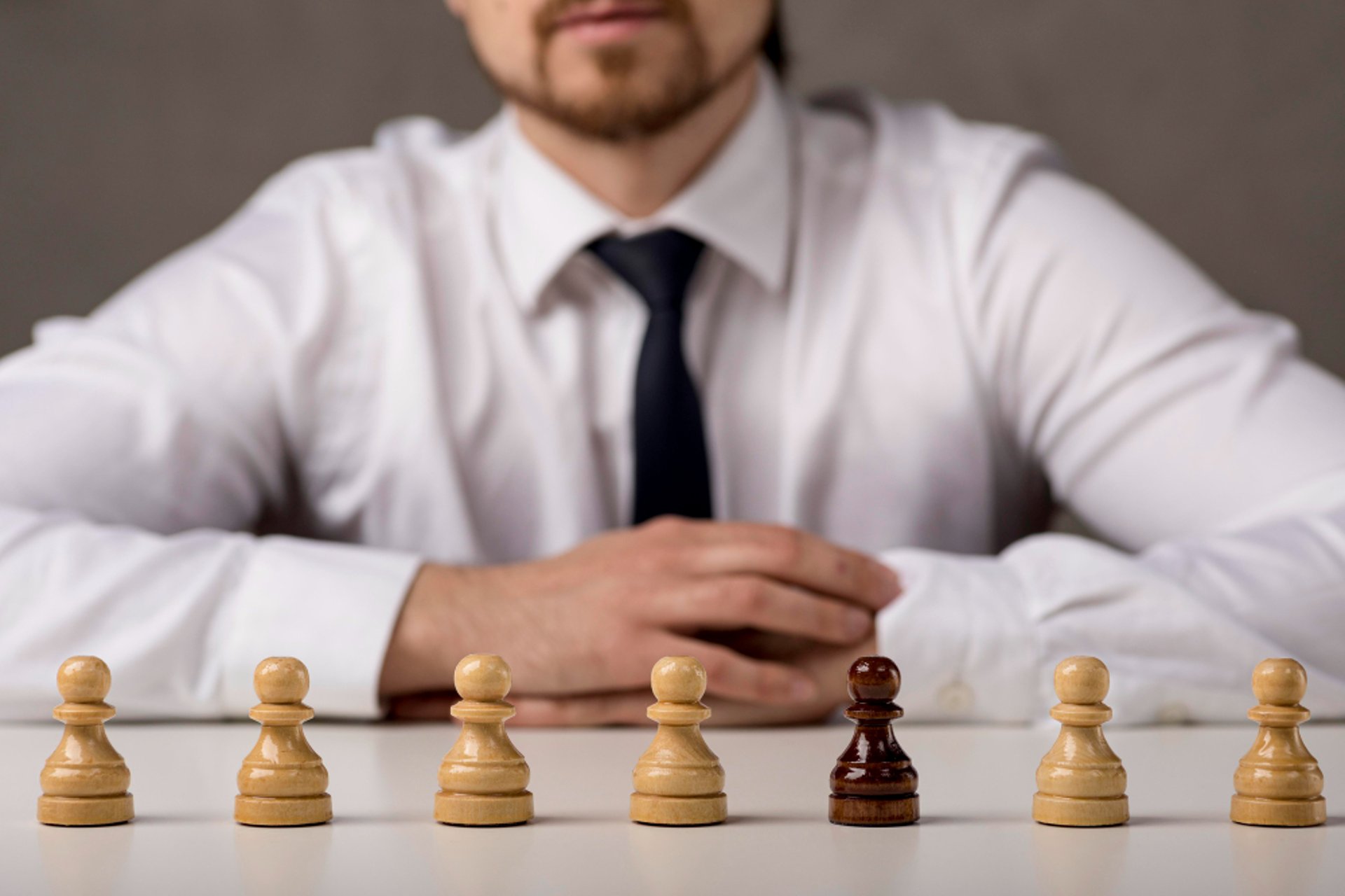 an abstract photo of a curved building with a blue sky in the background
