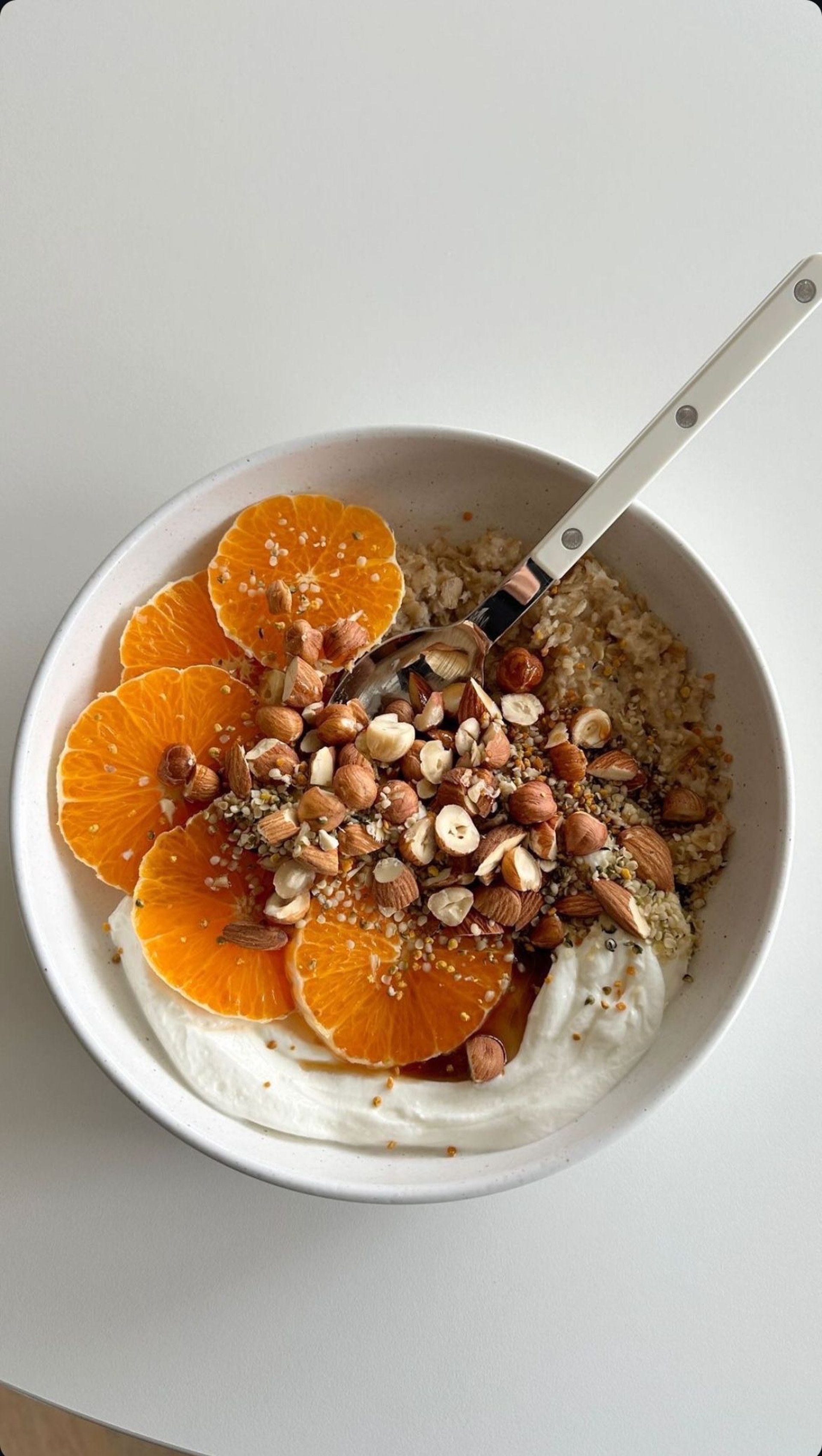 woman wearing yellow long-sleeved dress under white clouds and blue sky during daytime