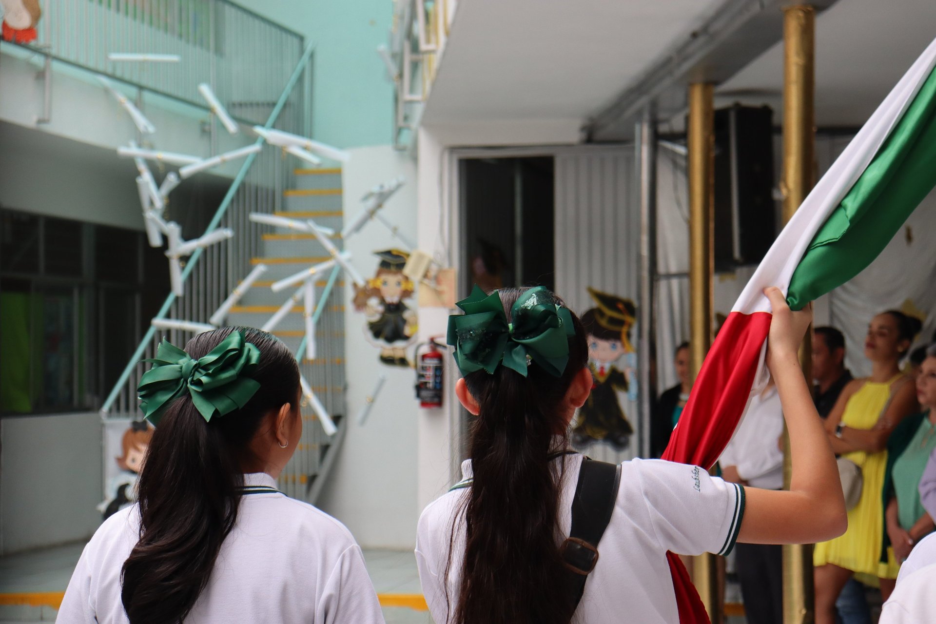 woman wearing yellow long-sleeved dress under white clouds and blue sky during daytime