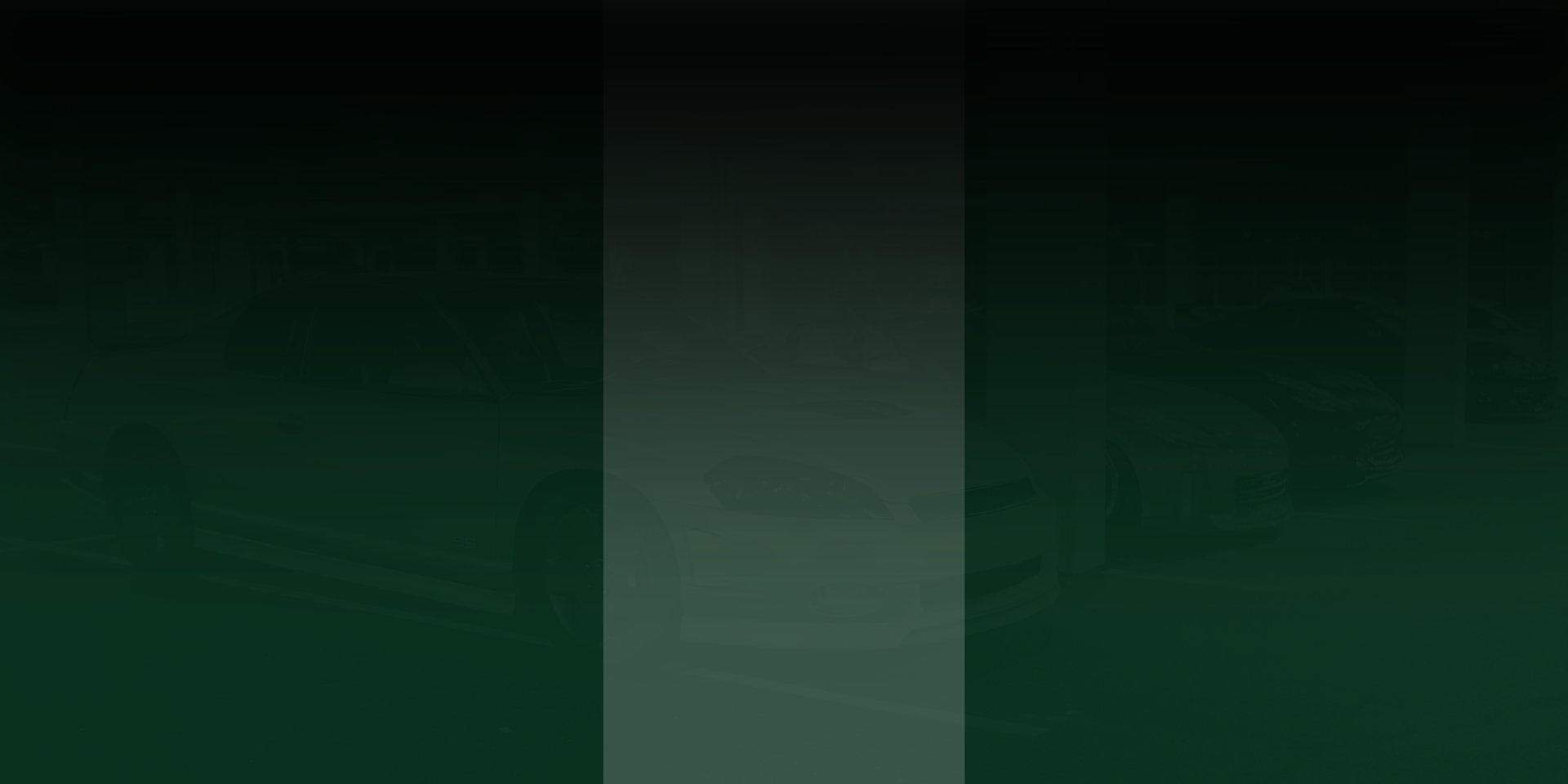 Three cars are parked at a gas station at night.