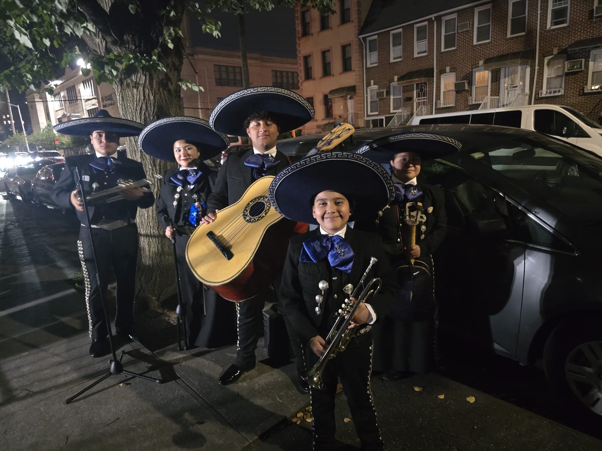 woman wearing yellow long-sleeved dress under white clouds and blue sky during daytime
