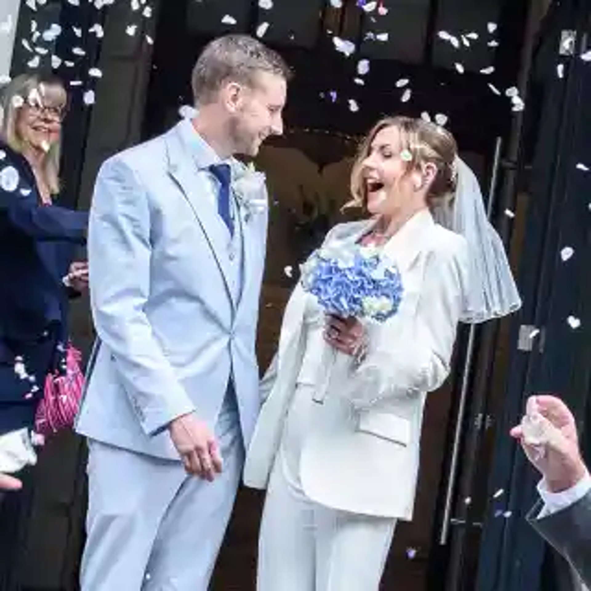 Newly-weds leaving the ceremony room