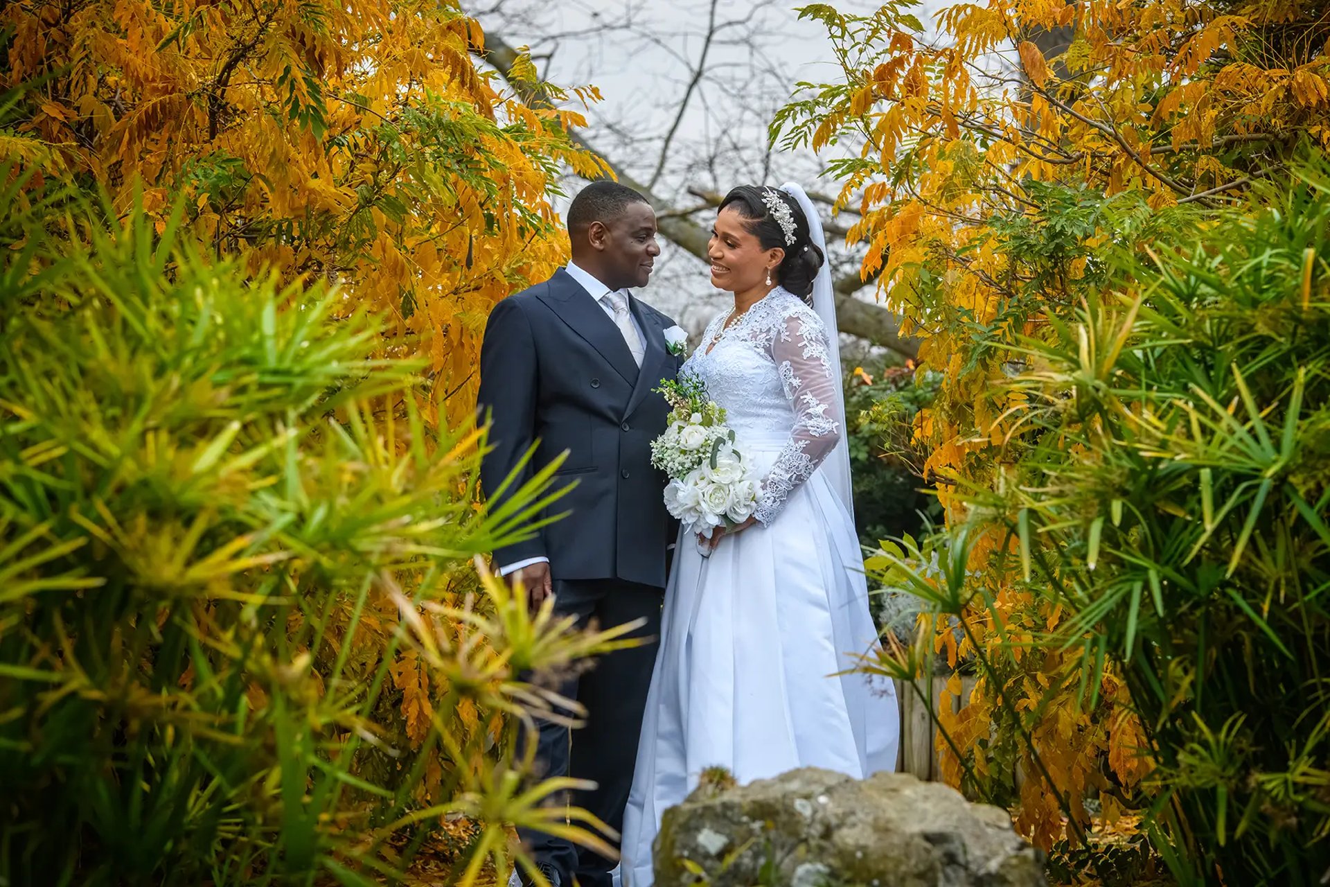 Wedding couple posing for a photograph 