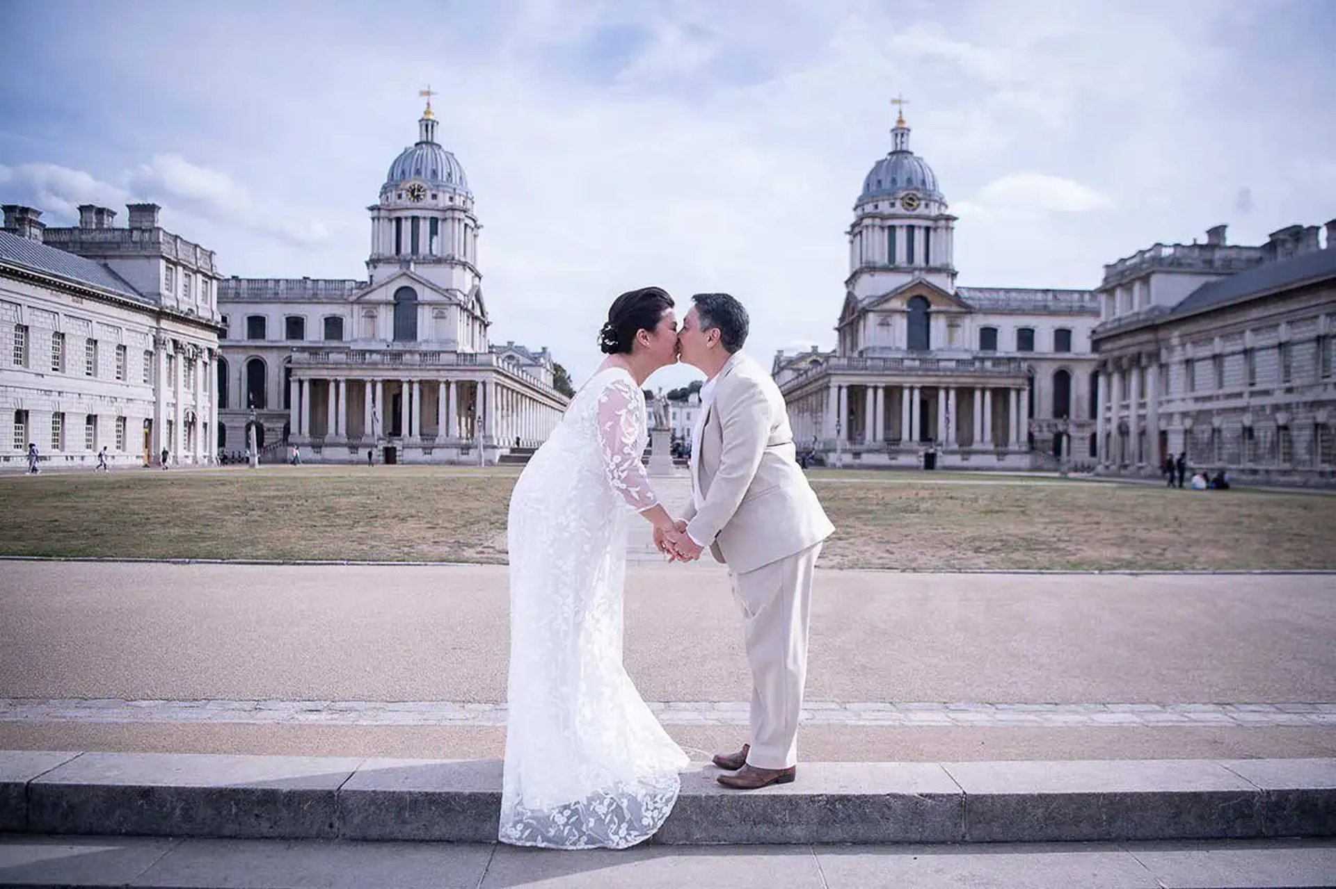 wedding couple standing in the grounds of the royal naval college greenwich