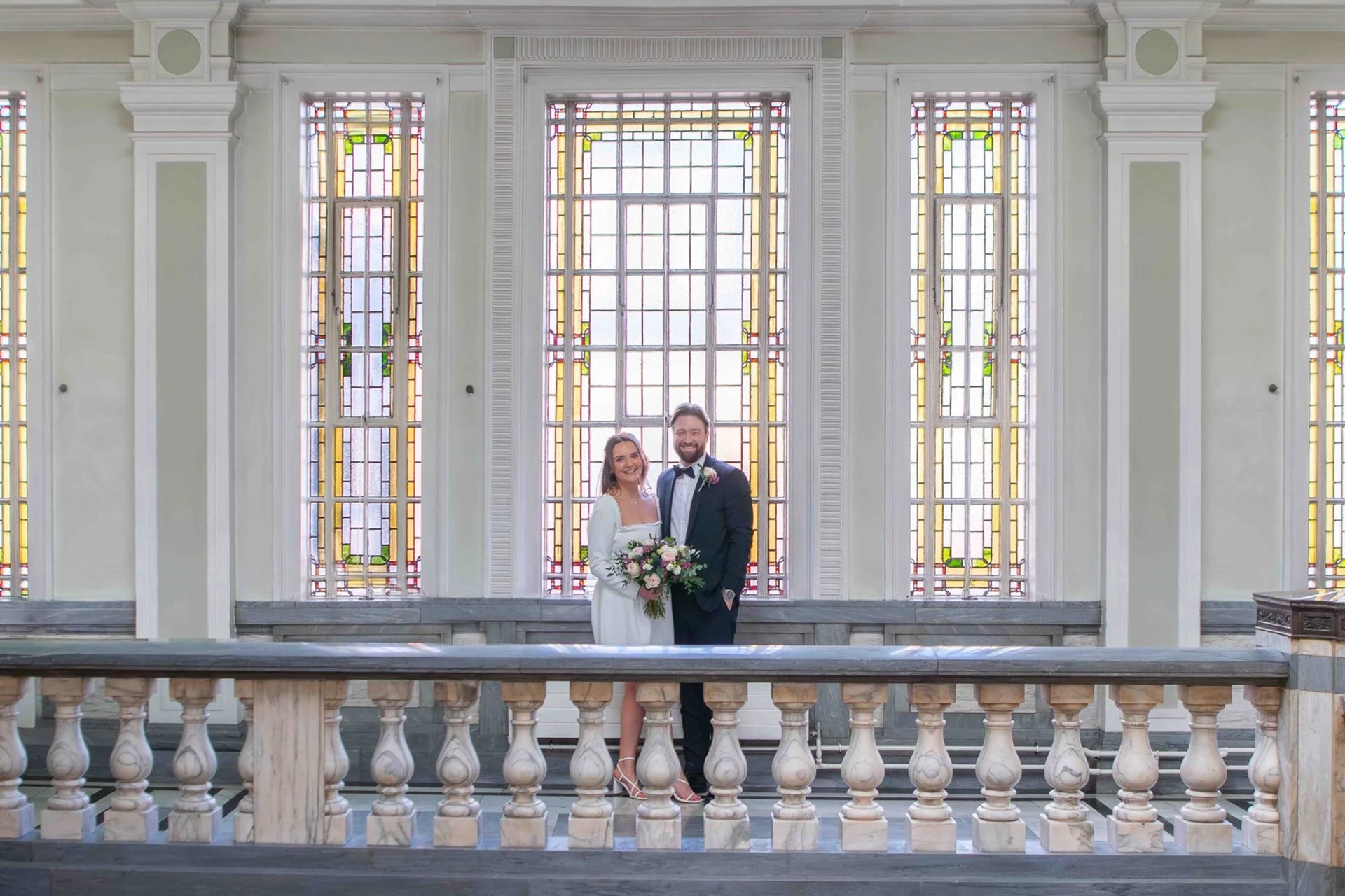 wedding couple standing in Islington Town Hall