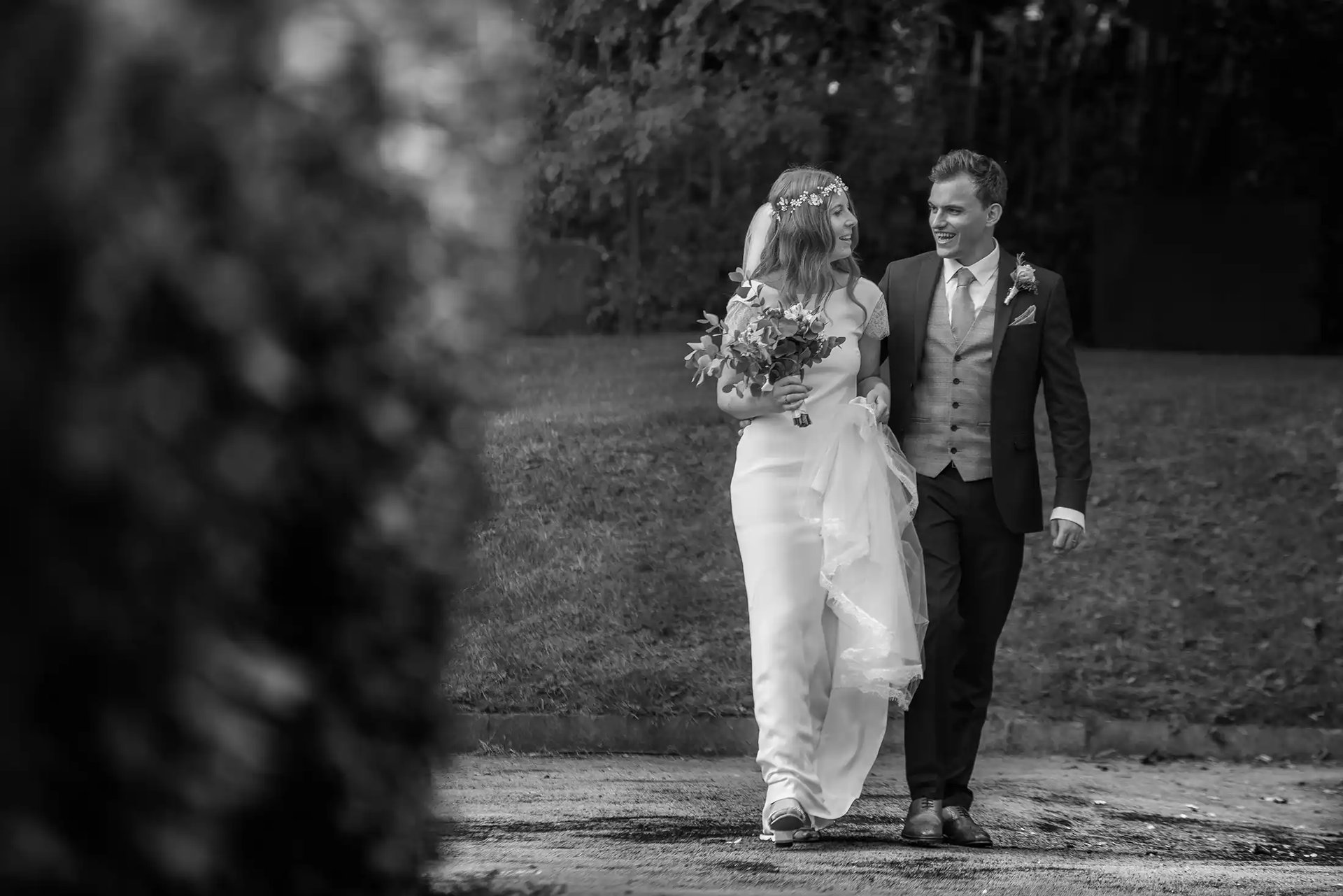 Liam and Lucy walking down the aisle after their wedding ceremony in Liverpool