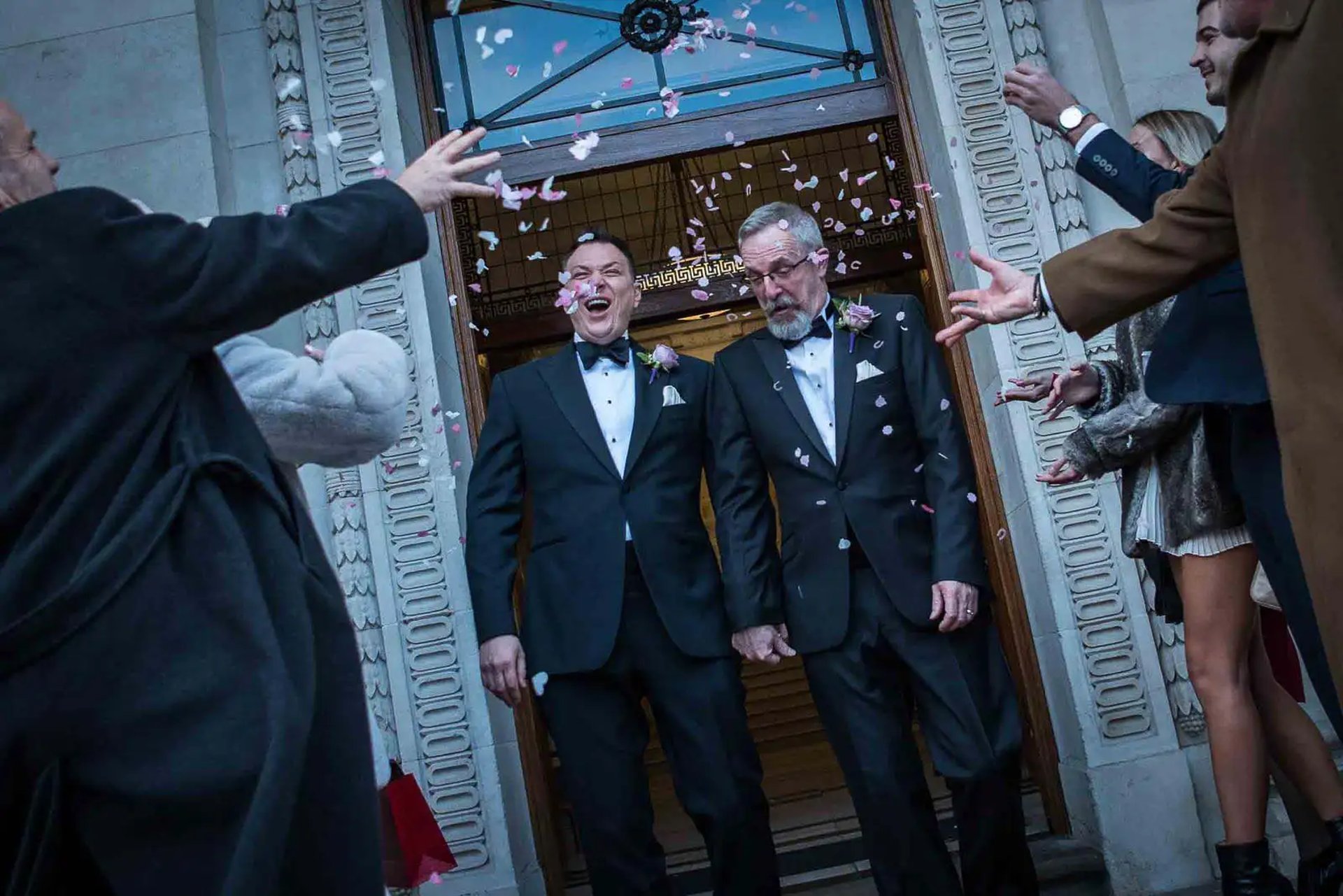 wedding couple having their confetti moment