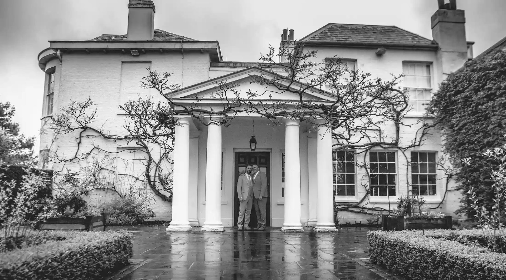 Alan and Marco standing at the main door of Pembroke Lodge Richmond