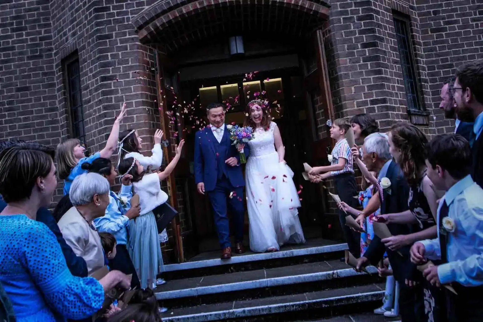 wedding couple leaving the church
