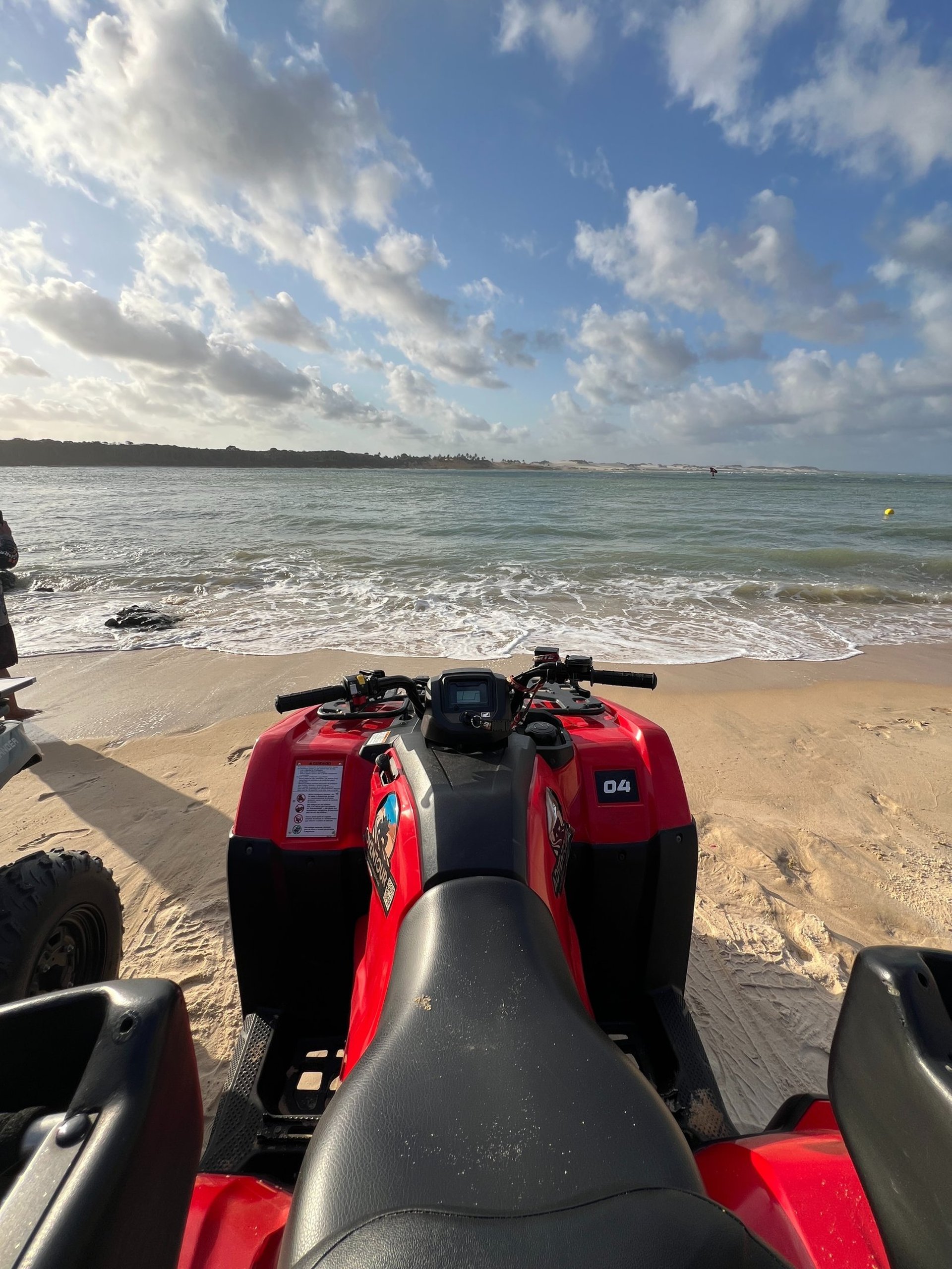 an abstract photo of a curved building with a blue sky in the background