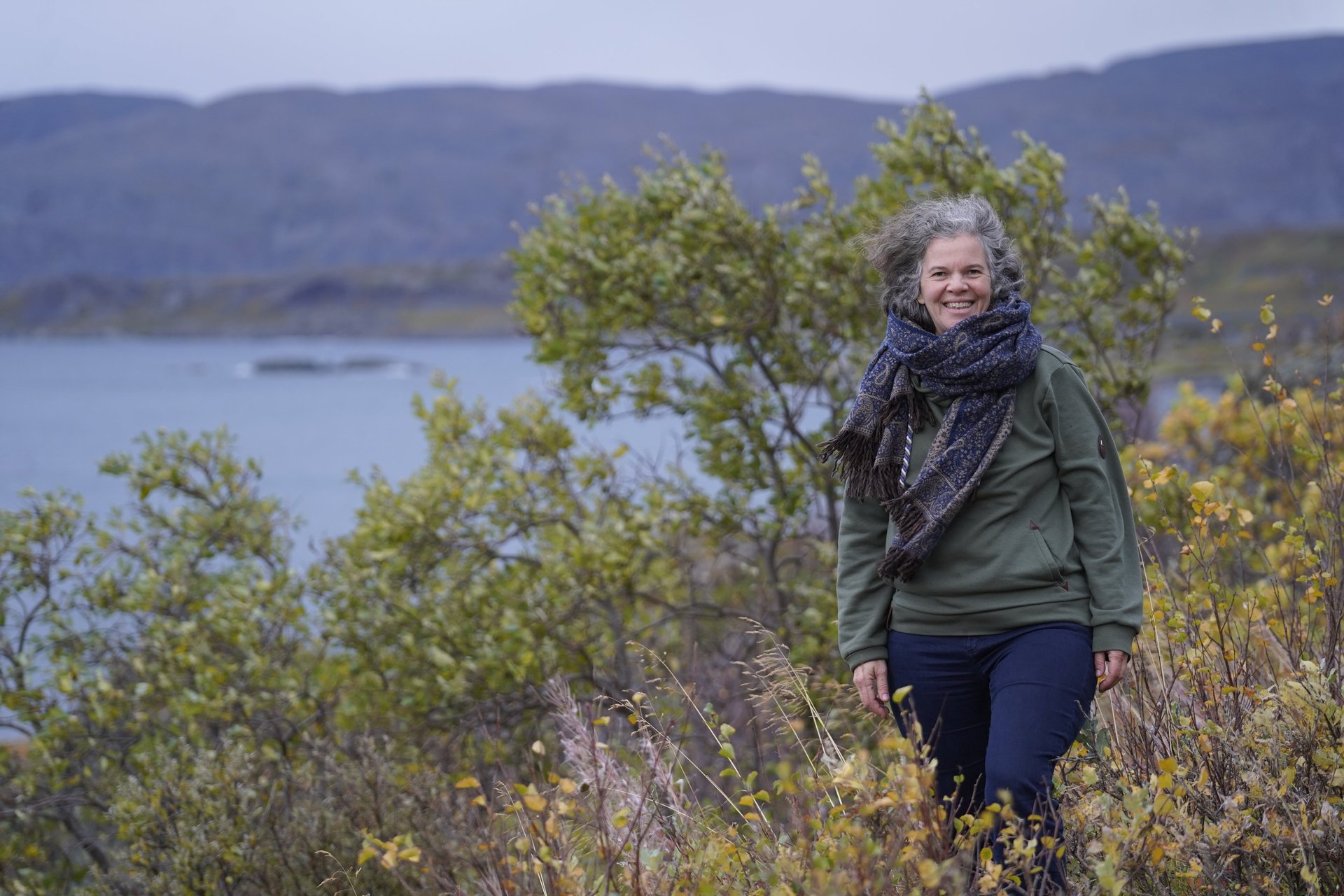 black and brown leather padded tub sofa
