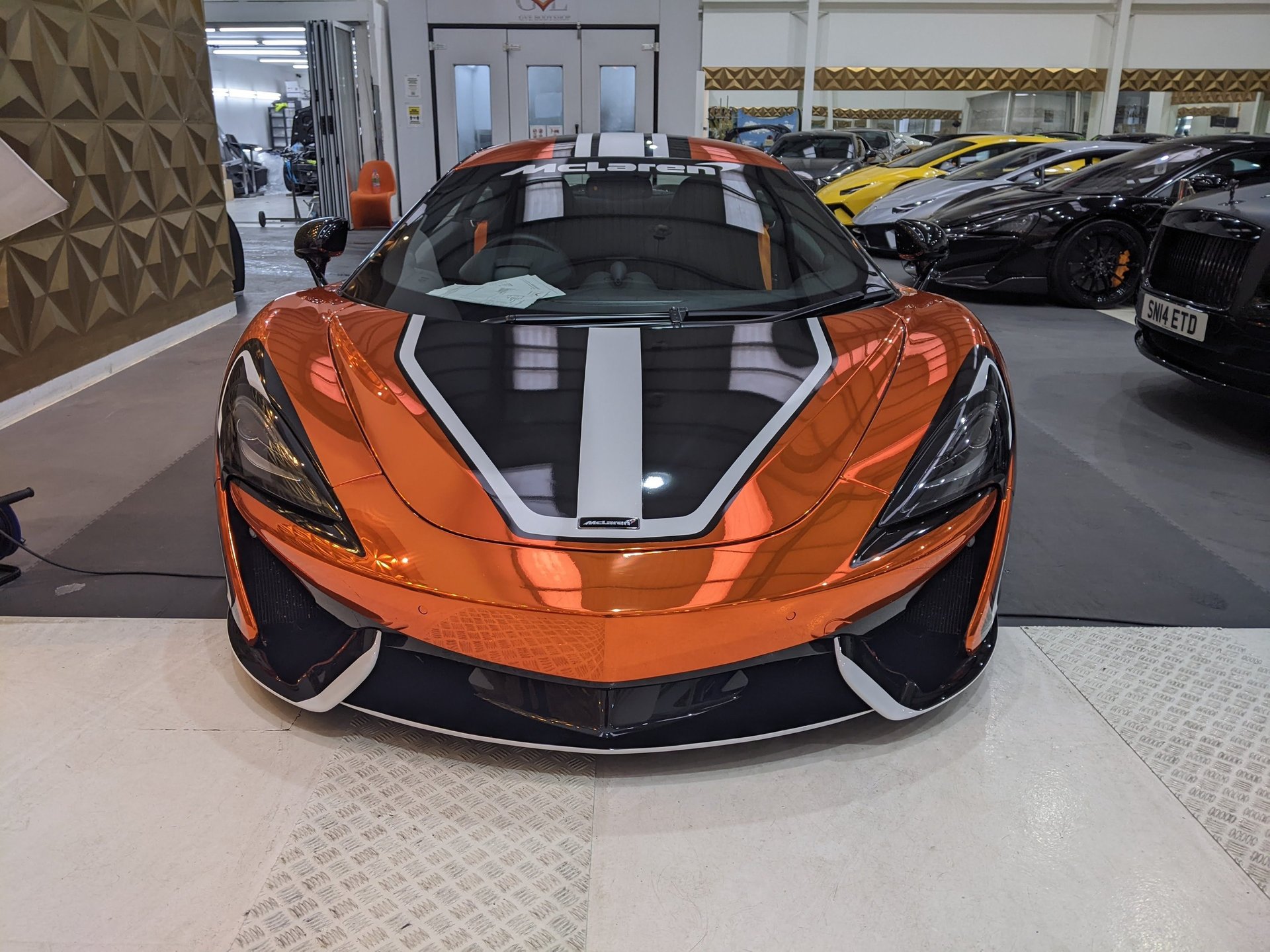 black and brown leather padded tub sofa