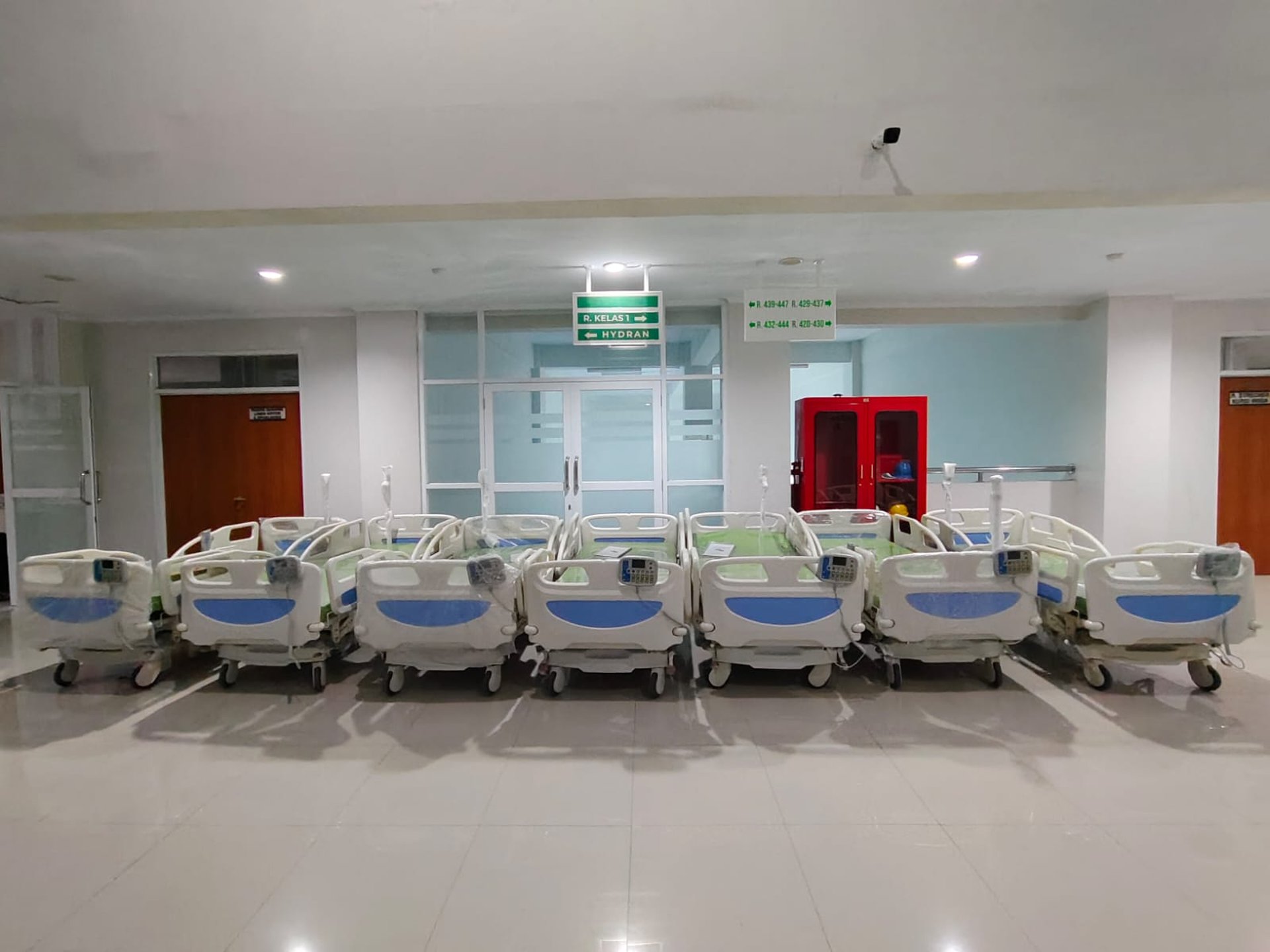 woman wearing yellow long-sleeved dress under white clouds and blue sky during daytime