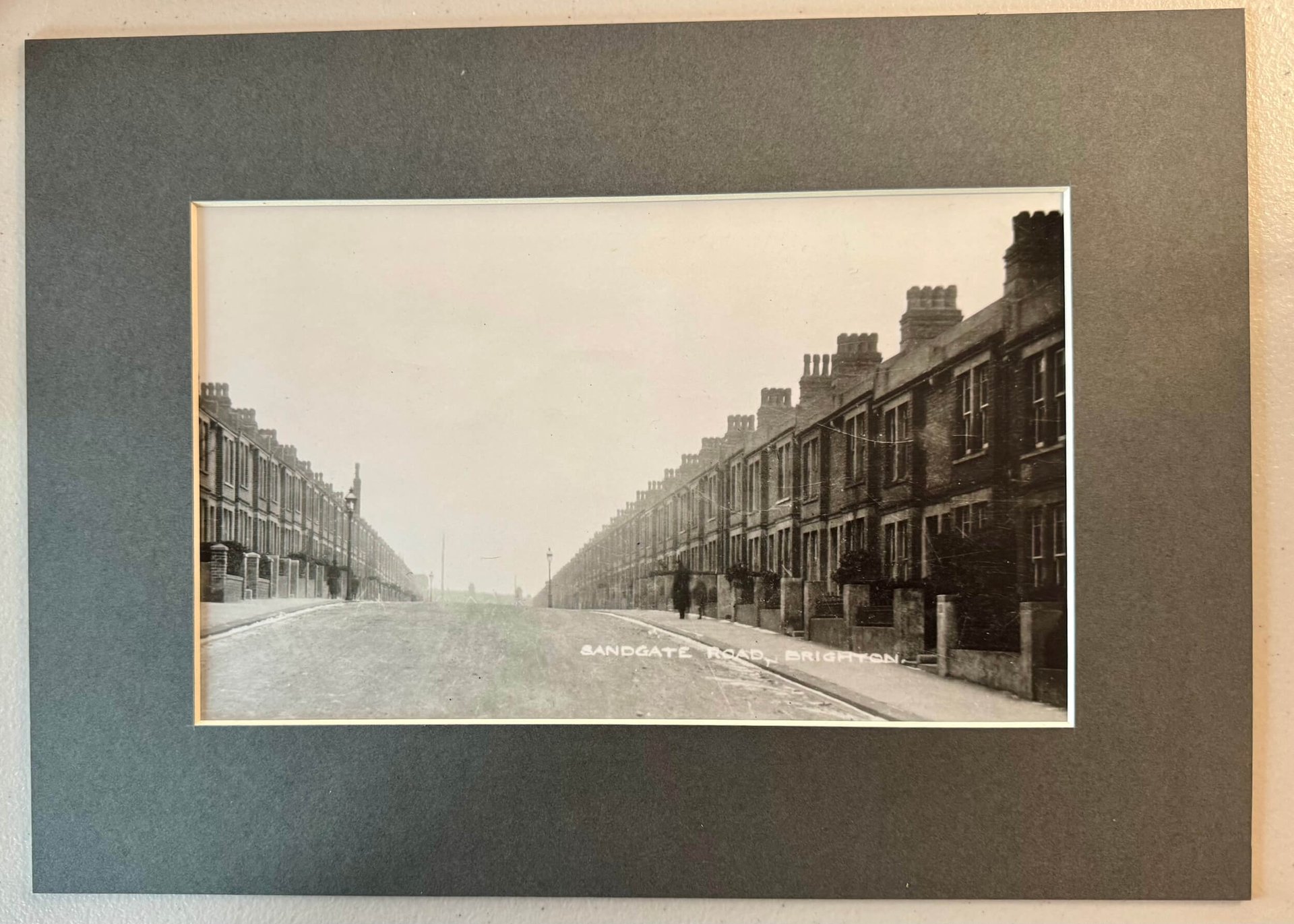 an abstract photo of a curved building with a blue sky in the background