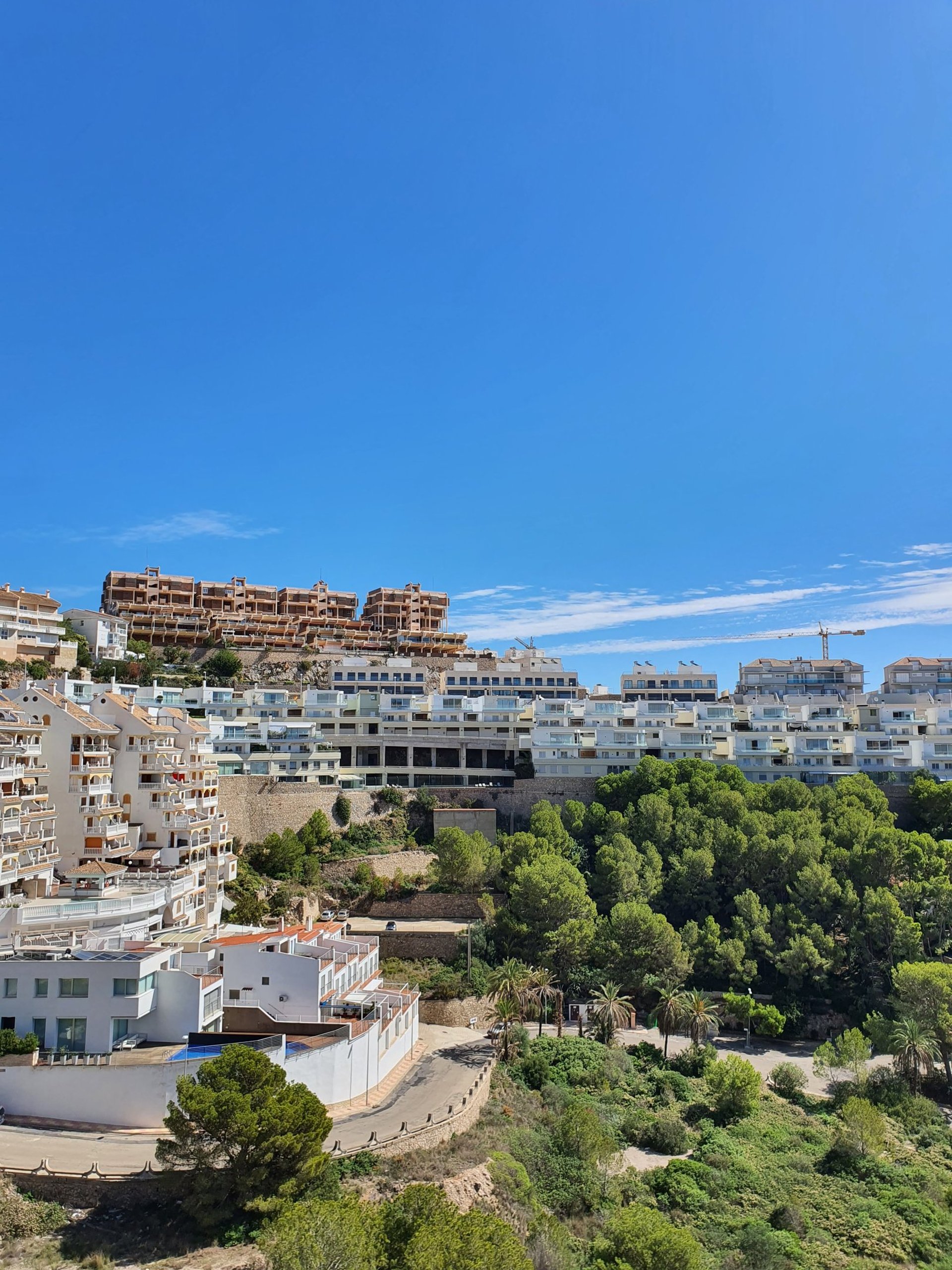 a man and a woman walking through an airport