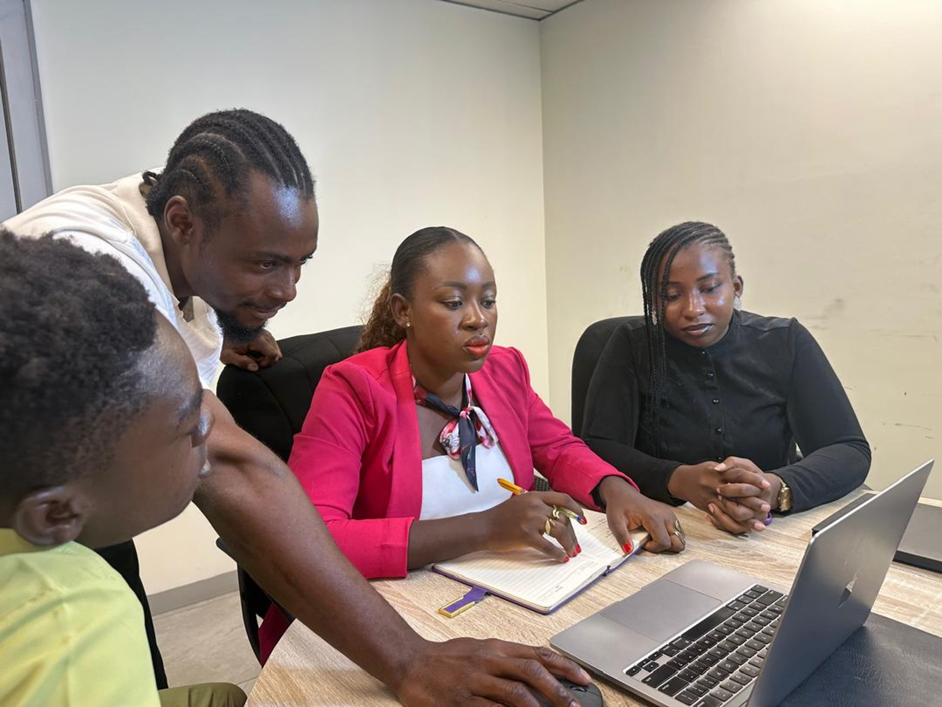 an abstract photo of a curved building with a blue sky in the background
