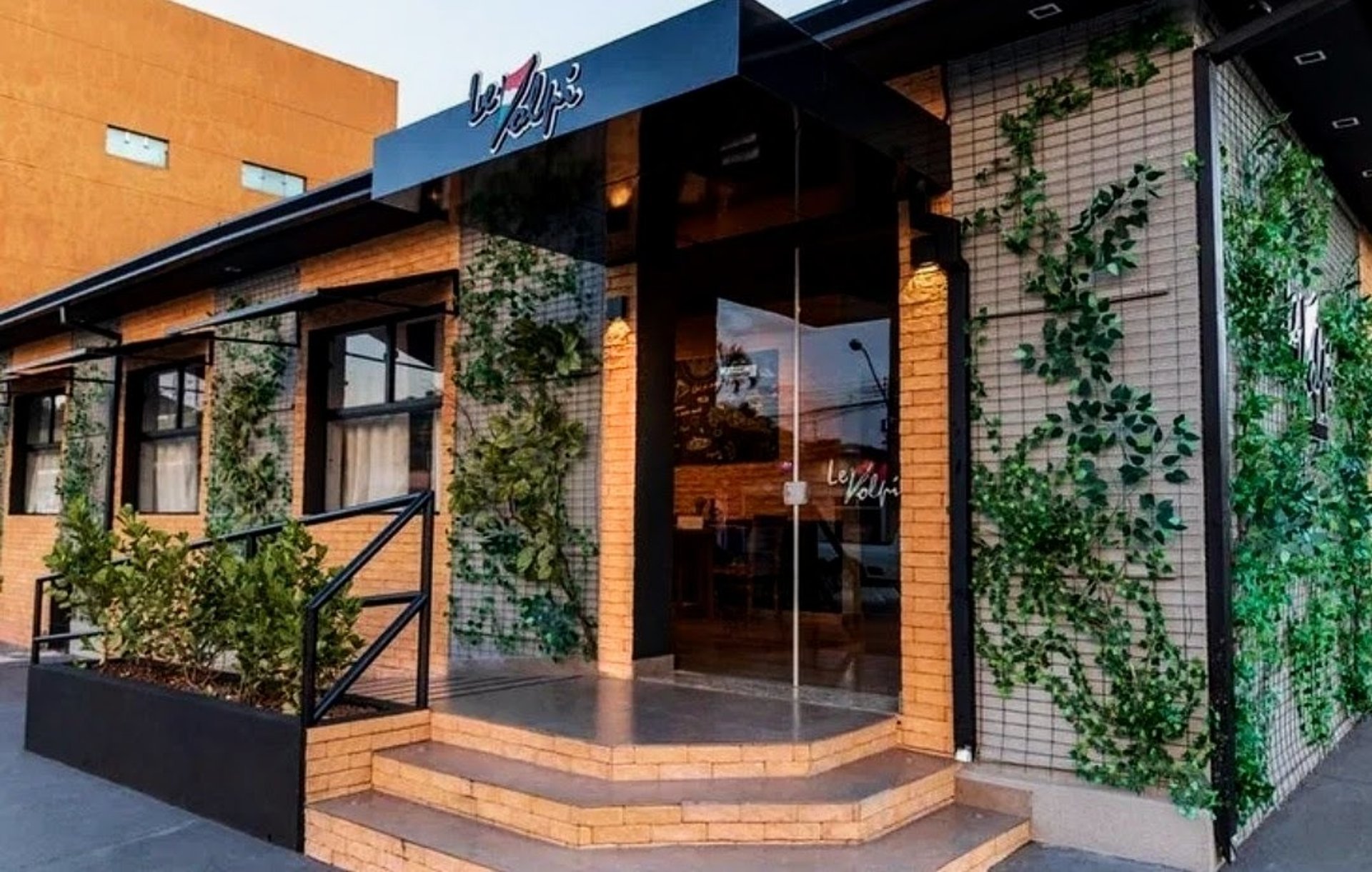 black and brown leather padded tub sofa