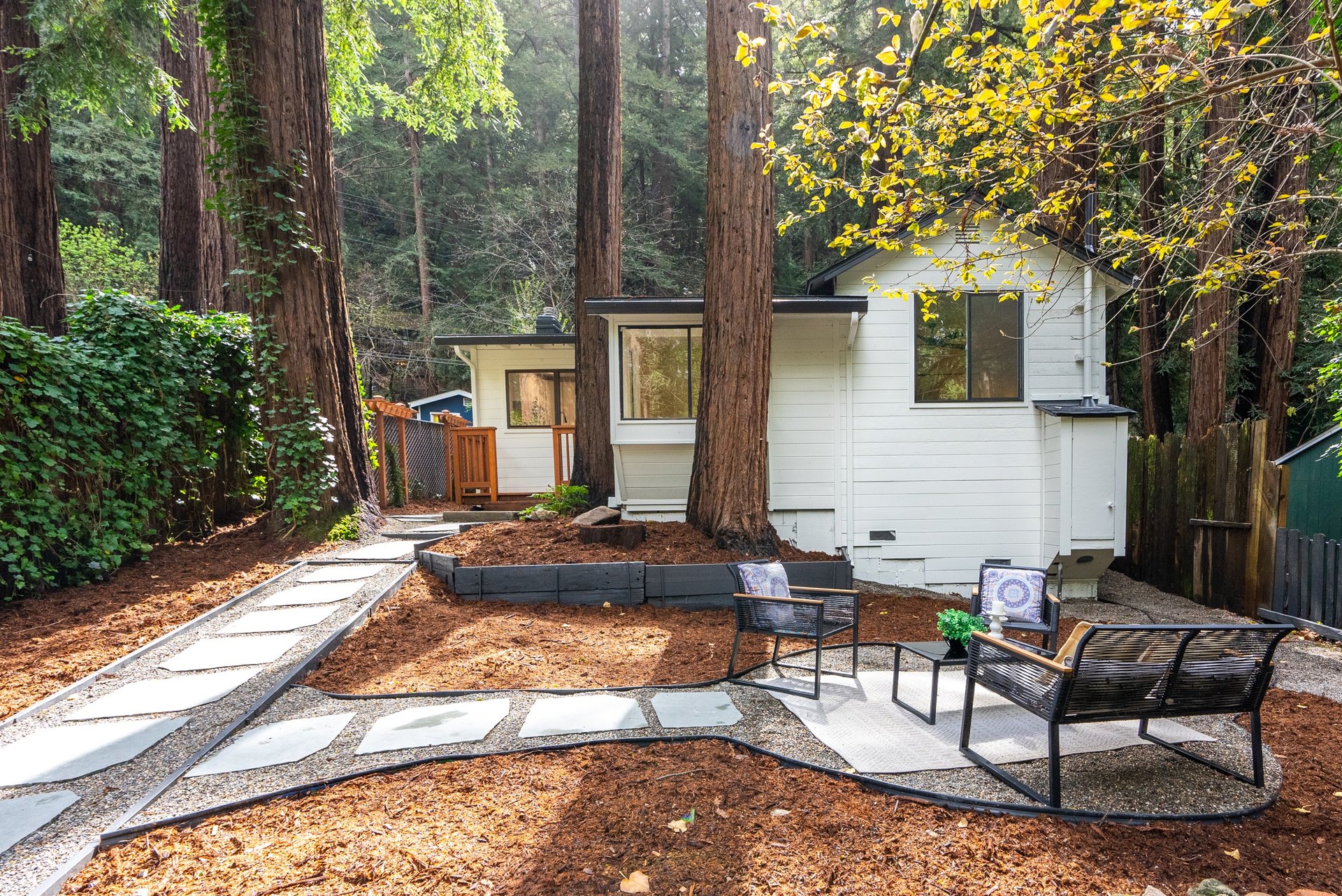 woman wearing yellow long-sleeved dress under white clouds and blue sky during daytime