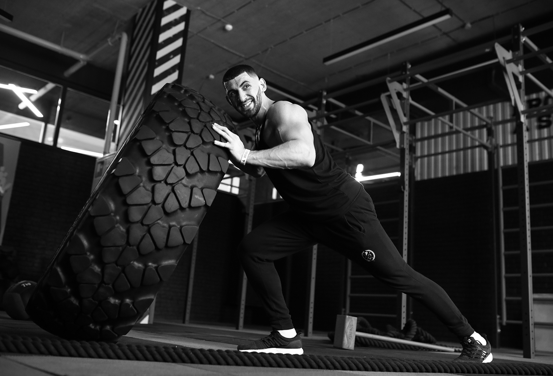 black and brown leather padded tub sofa